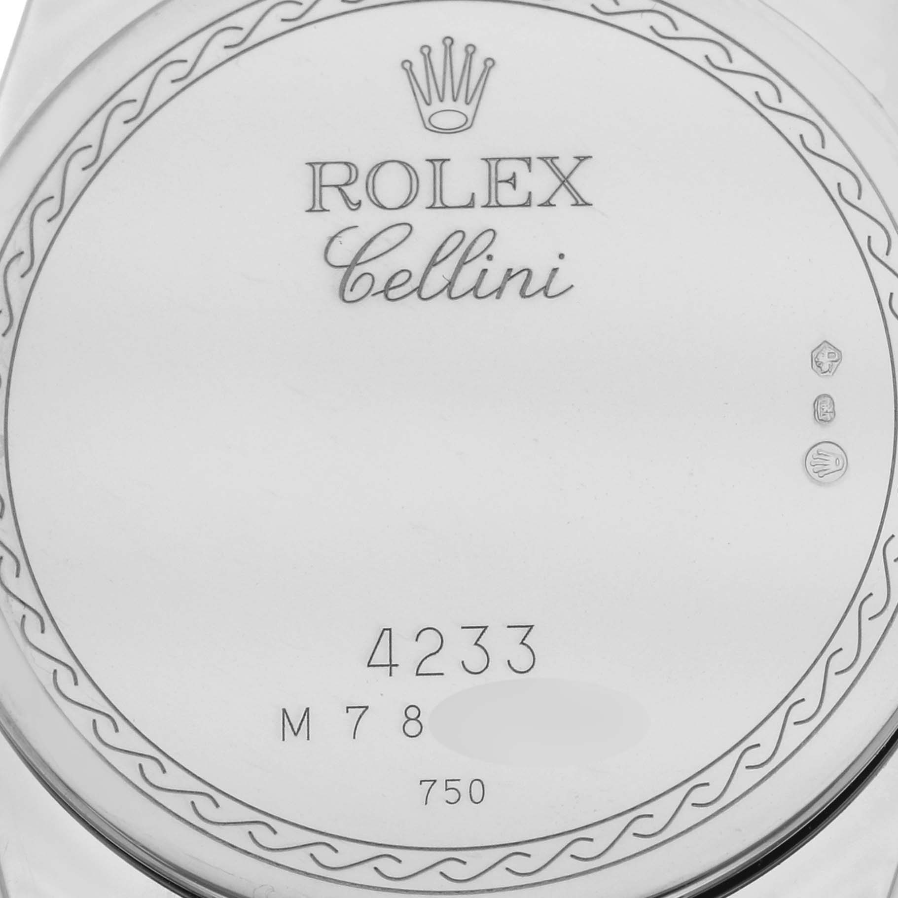 Close-up of the case back of a Rolex Cellini 4233 Men's White Gold White Dial 4233 Men's White Gold White Dial, showing the model number and hallmark engravings.