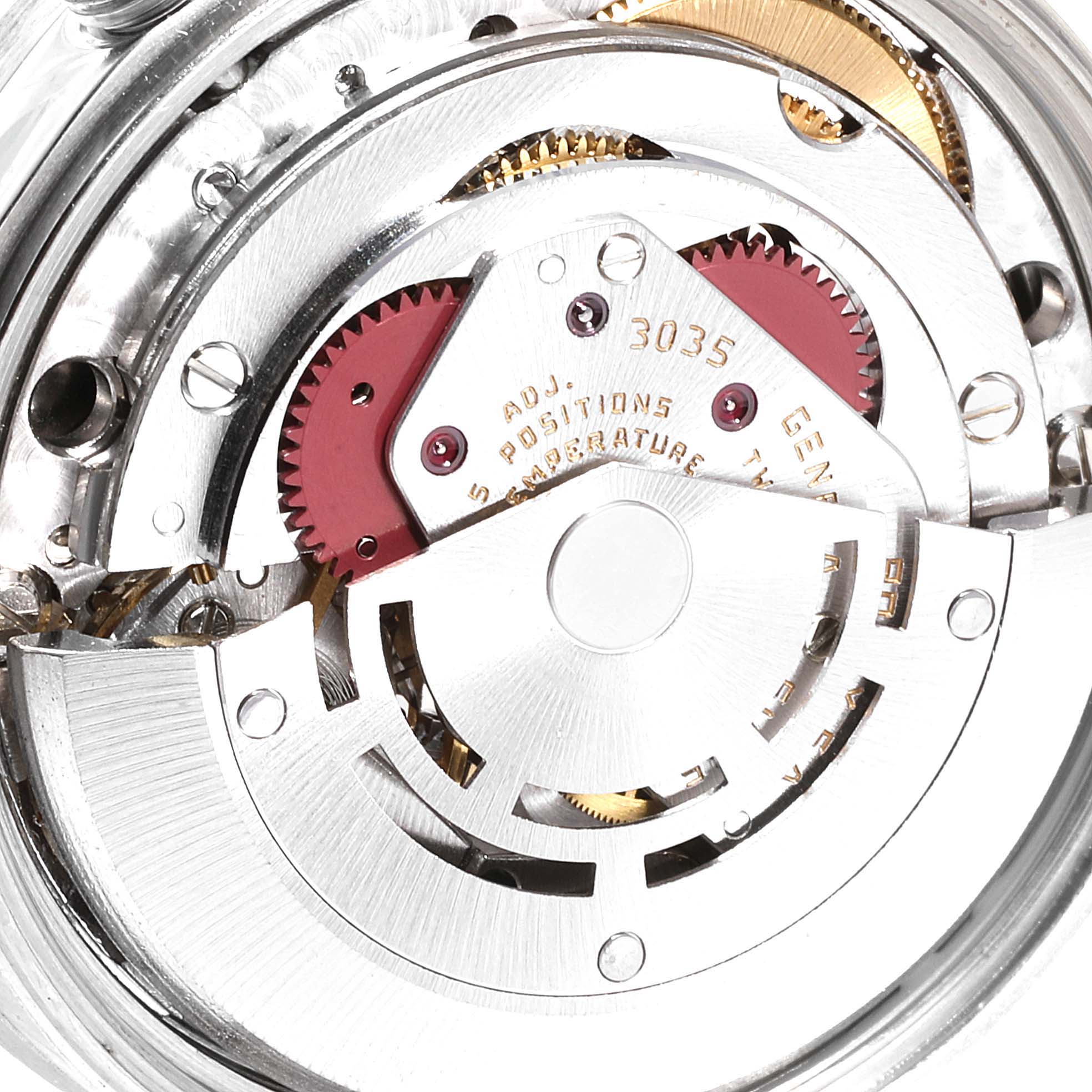 This is a close-up view of the movement mechanism of a Rolex Date 15010 Men's Stainless Steel Silver Dial 15010 Men's Stainless Steel Silver Dial model watch.