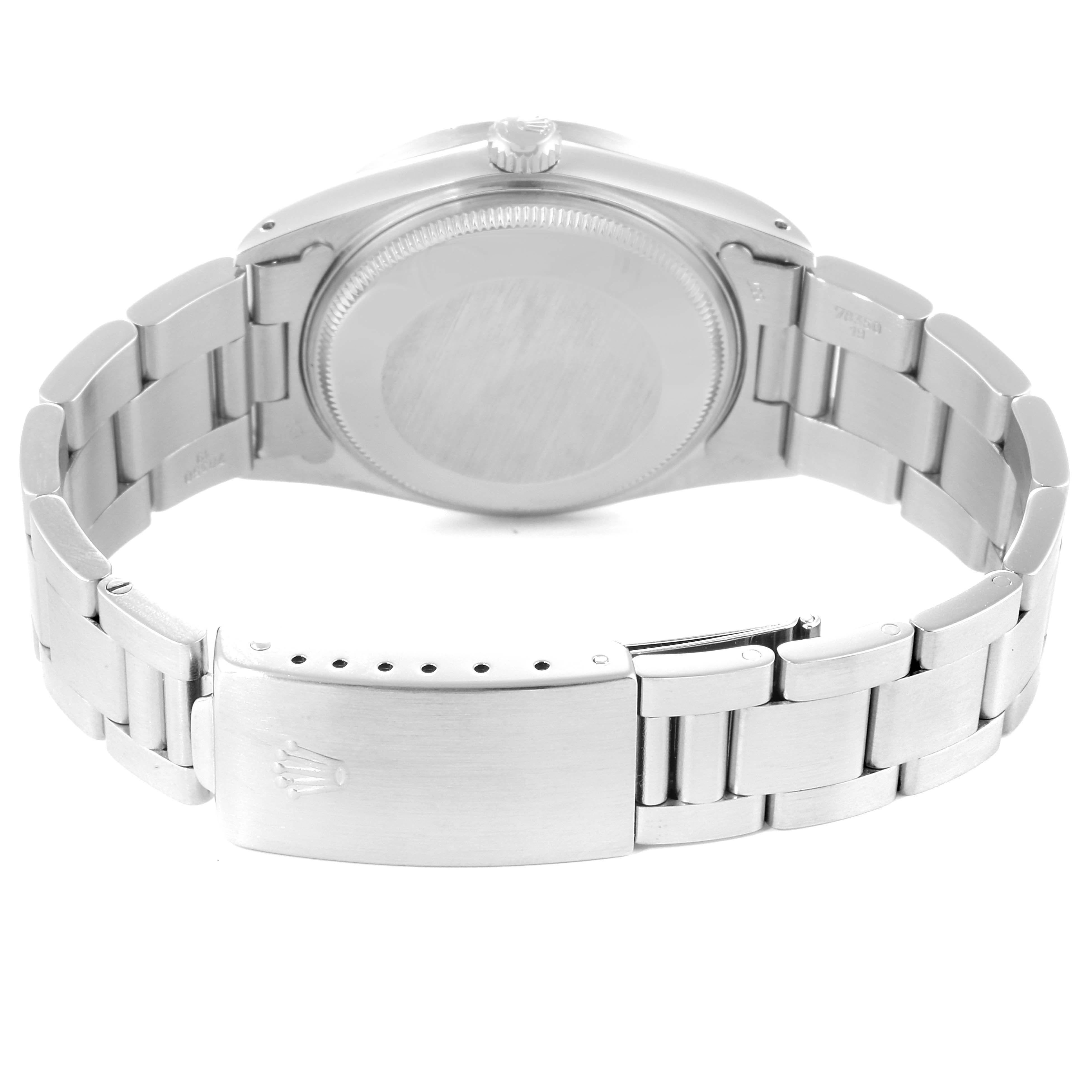 The image shows the back and bracelet of a Rolex Date 15010 Men's Stainless Steel Silver Dial 15010 Men's Stainless Steel Silver Dial model watch.