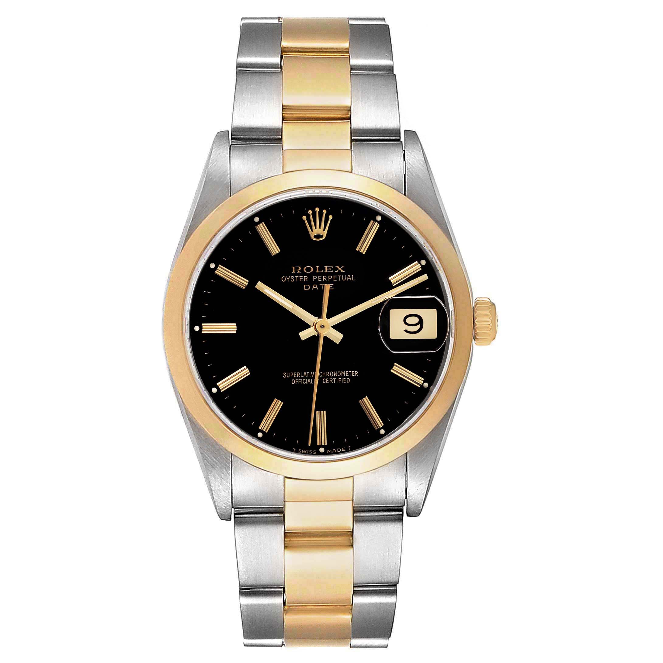 This Rolex Oyster Perpetual Date watch is shown from a top-down angle, highlighting its two-tone bracelet, black dial, and date window.