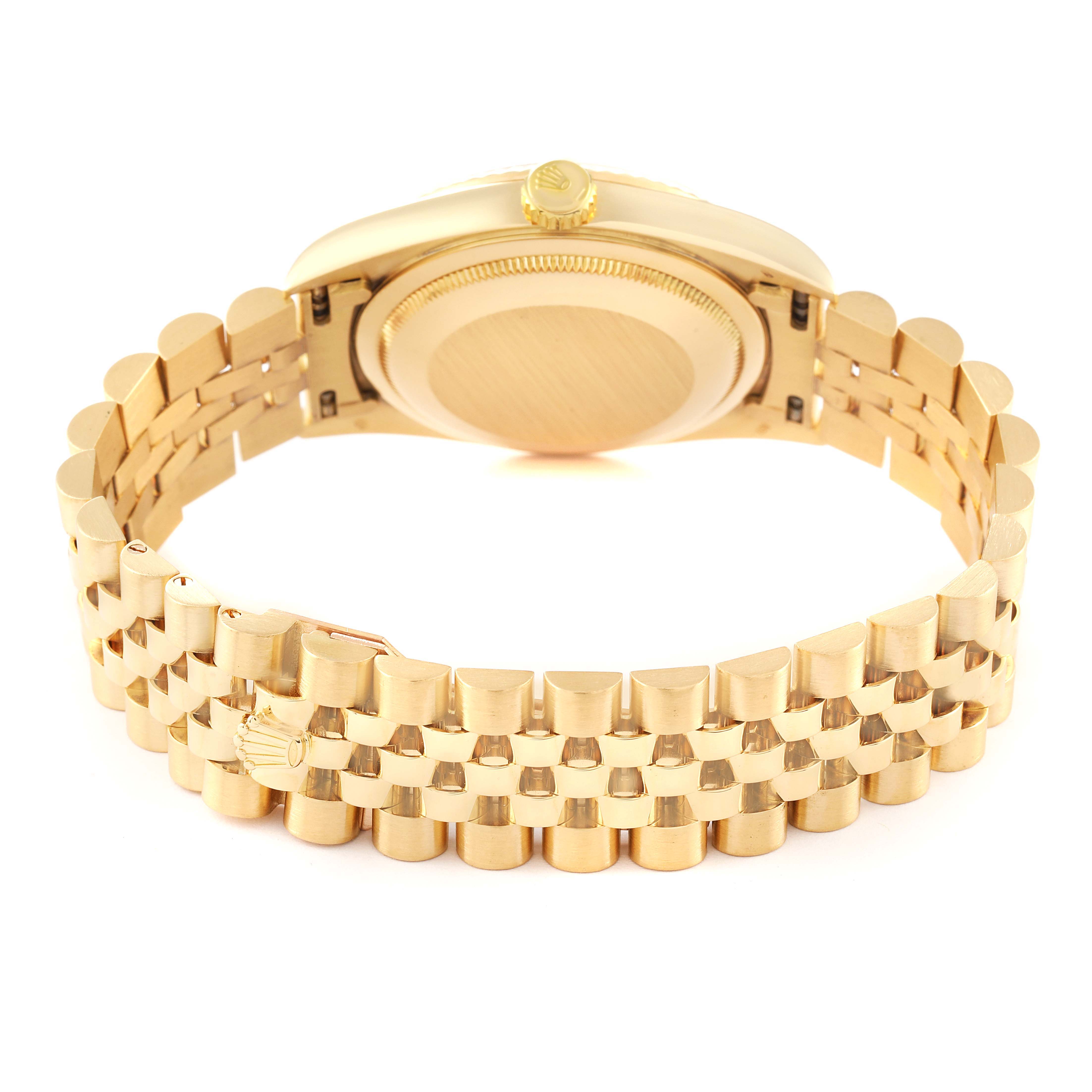 The image shows the back view of a Rolex Datejust 16238 Men's Yellow Gold Champagne Dial 16238 Men's Yellow Gold Champagne Dial watch, highlighting its gold bracelet and case back.