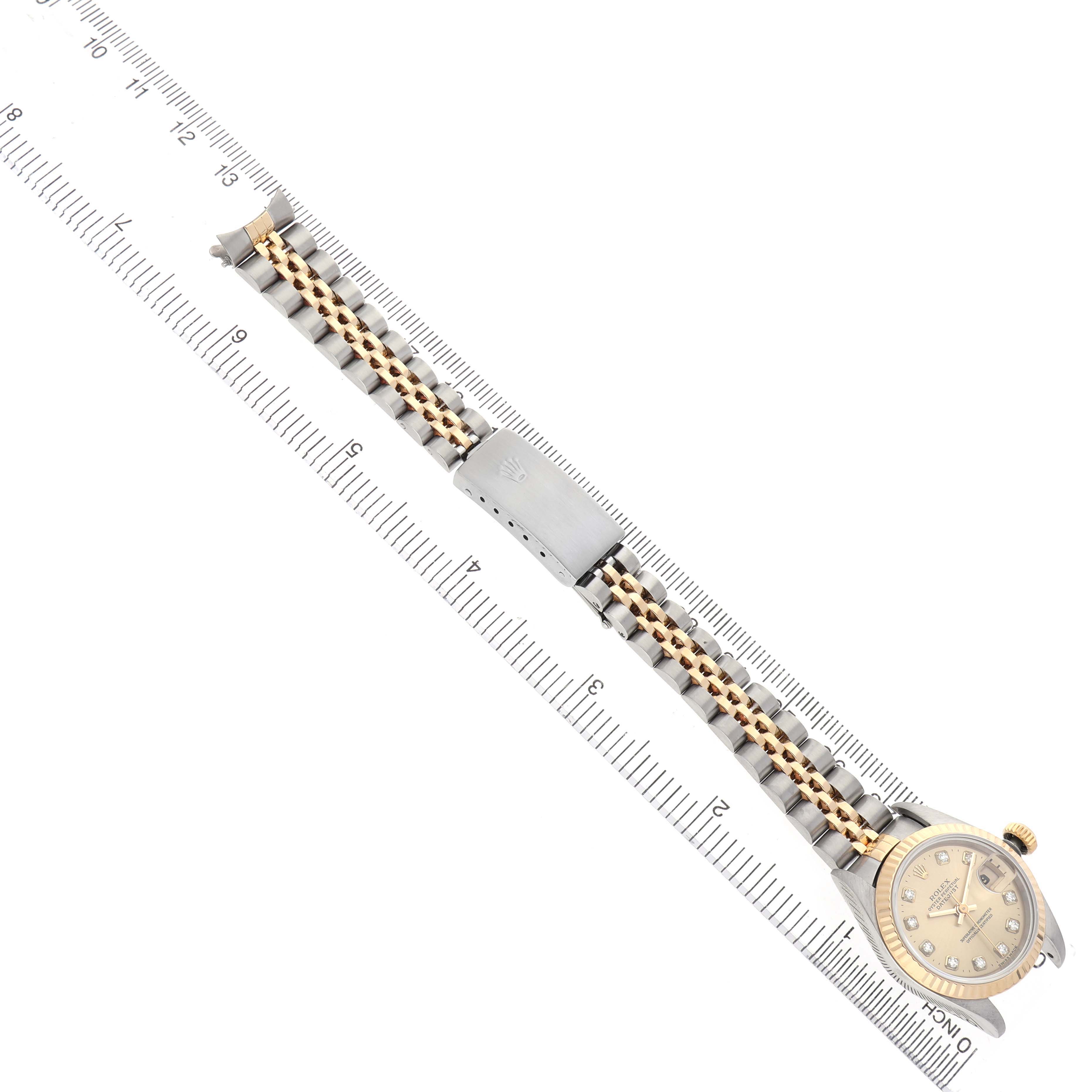 The Rolex Datejust 69173 Women's Stainless Steel Champagne Dial watch is shown fully extended, highlighting the bracelet, clasp, and a frontal view of the dial.