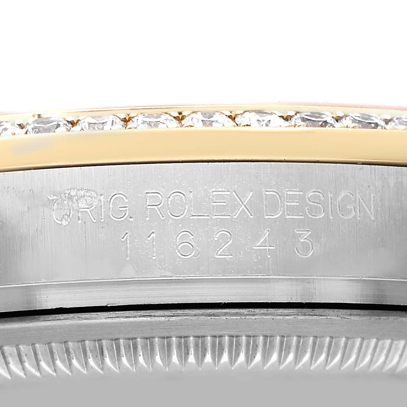 The image shows a close-up side view of a Rolex Datejust 116243 Men's Stainless Steel Silver Dial watch with visible engravings and a diamond-set bezel.