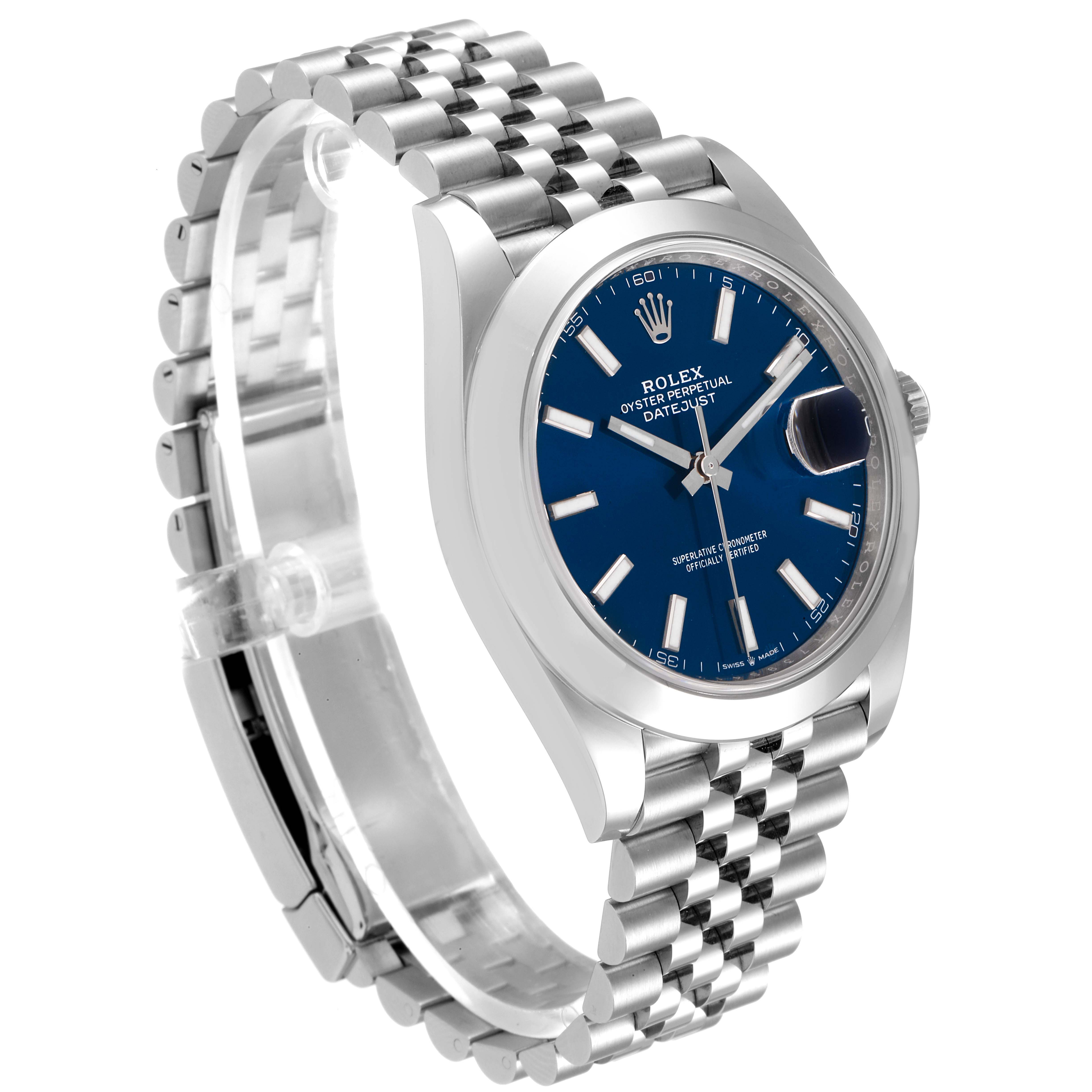 The Rolex Datejust 41 126300 Men
s Stainless Steel Blue Dial 126300 Men
s Stainless Steel Blue Dial watch is shown at a three-quarter angle, highlighting the blue dial, jubilee bracelet, and cyclops date window.