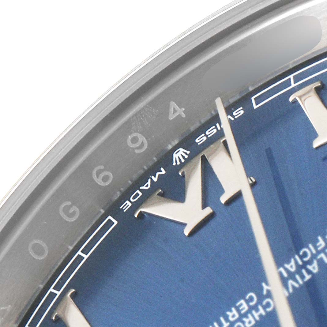 The close-up image shows the dial, engraved bezel, and part of the casing of a Rolex Datejust 41 126300 Men
s Stainless Steel Blue Dial 126300 Men
s Stainless Steel Blue Dial watch.