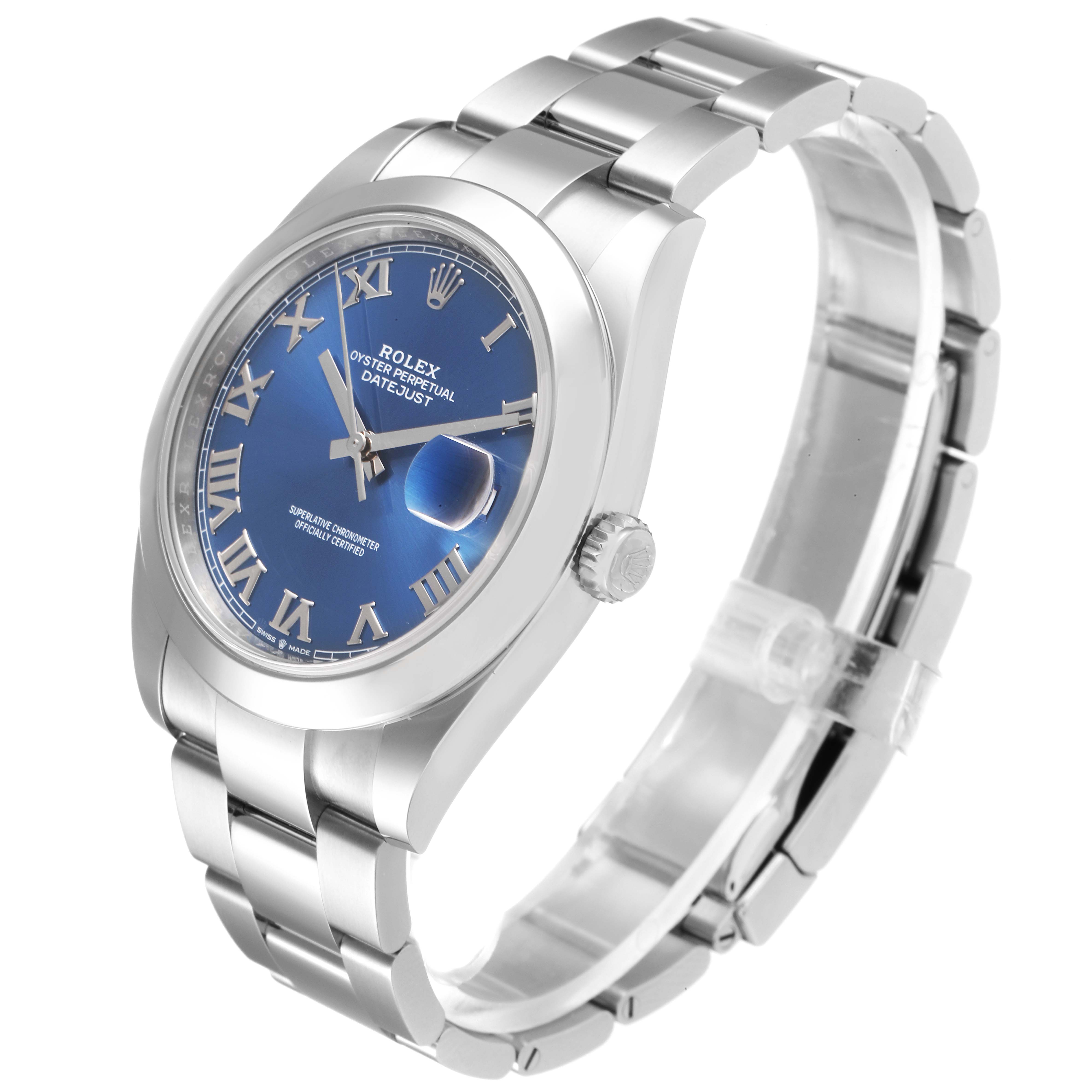 The Rolex Datejust 41 126300 Men
s Stainless Steel Blue Dial 126300 Men
s Stainless Steel Blue Dial watch is shown at an angled side view, highlighting its face, bezel, crown, and bracelet.