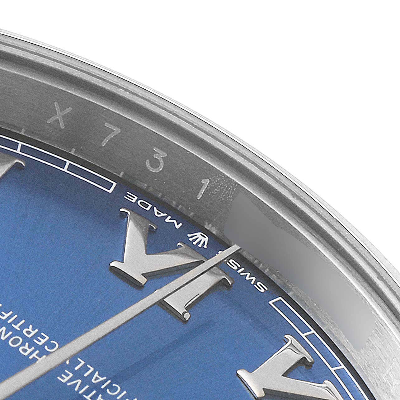 The image shows a close-up of the dial and bezel of the Rolex Datejust 41 126300 Men's Stainless Steel Blue Dial 126300 Men's Stainless Steel Blue Dial, focusing on the hour markers and the "Swiss Made" inscription.