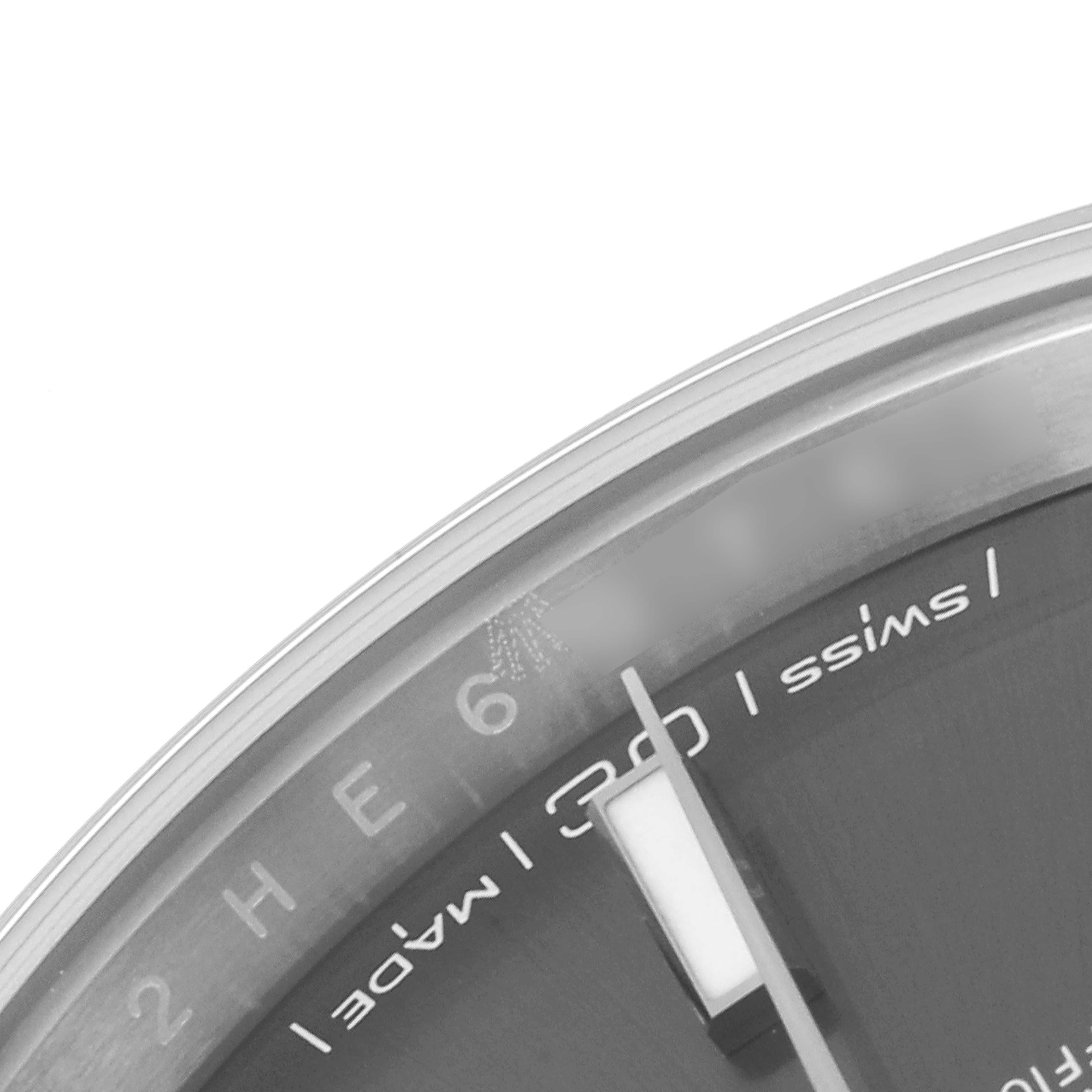 This is an angled close-up of the Datejust 41 Rolex watch, showing the dial, part of the bezel, and the minute hand.