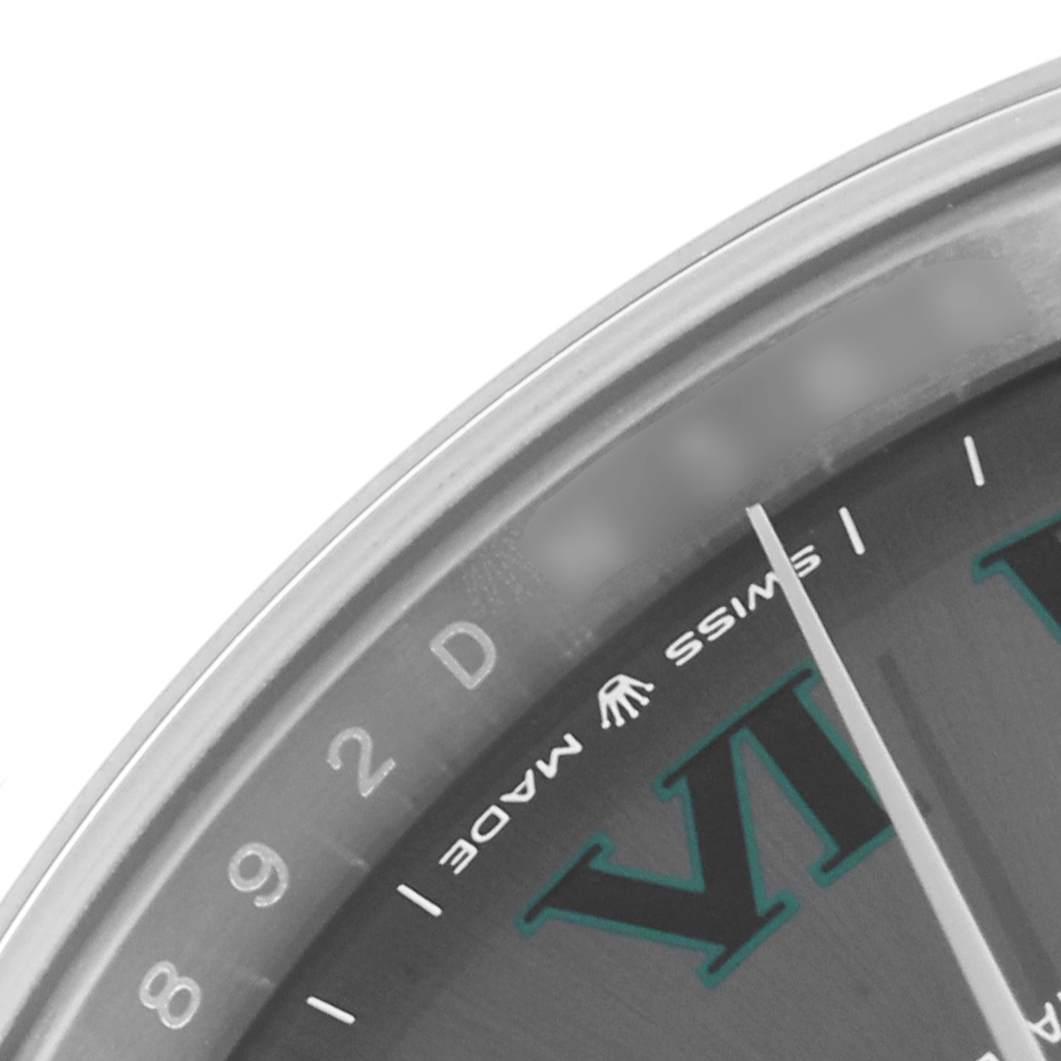 This close-up image of a Rolex Datejust 41 126300 Men's Stainless Steel Grey Dial 126300 Men's Stainless Steel Grey Dial watch showcases part of the dial, hands, and Roman numeral hour markers.