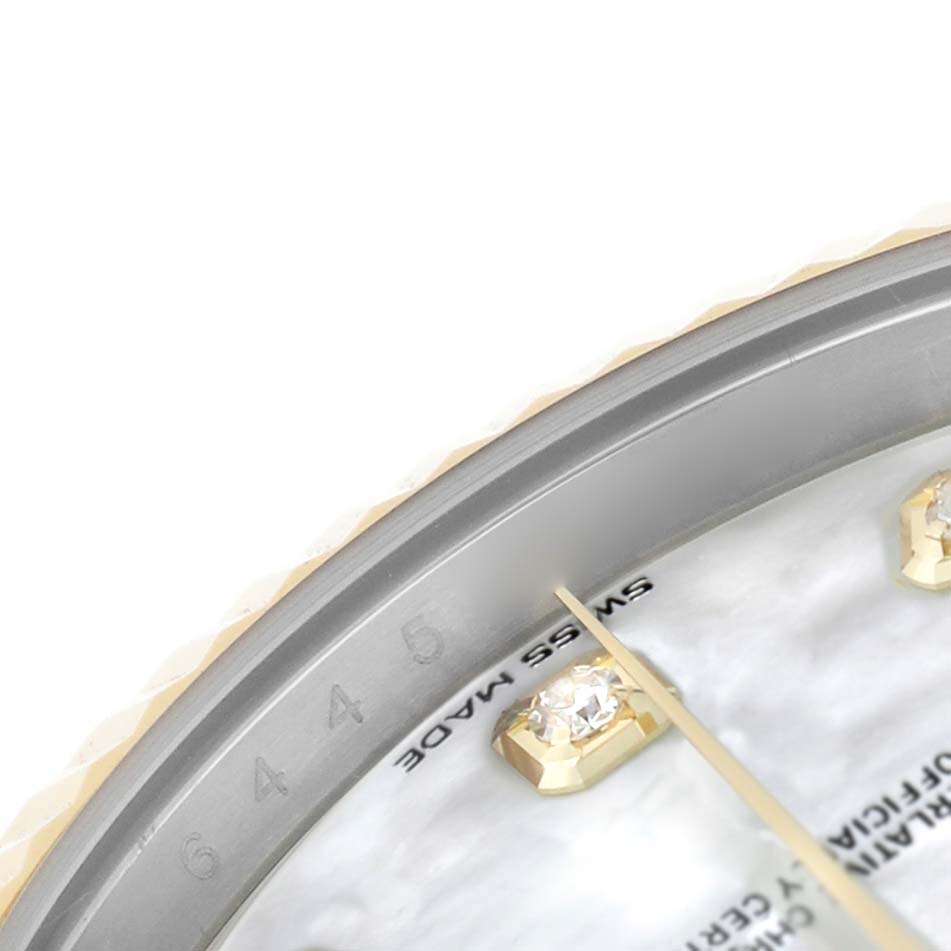 This image shows a close-up of the dial edge and bezel of a Rolex Datejust 41 126333 Men's Steel and Gold (two tone) Mother of Pearl Dial, highlighting the gold-set diamond hour markers.
