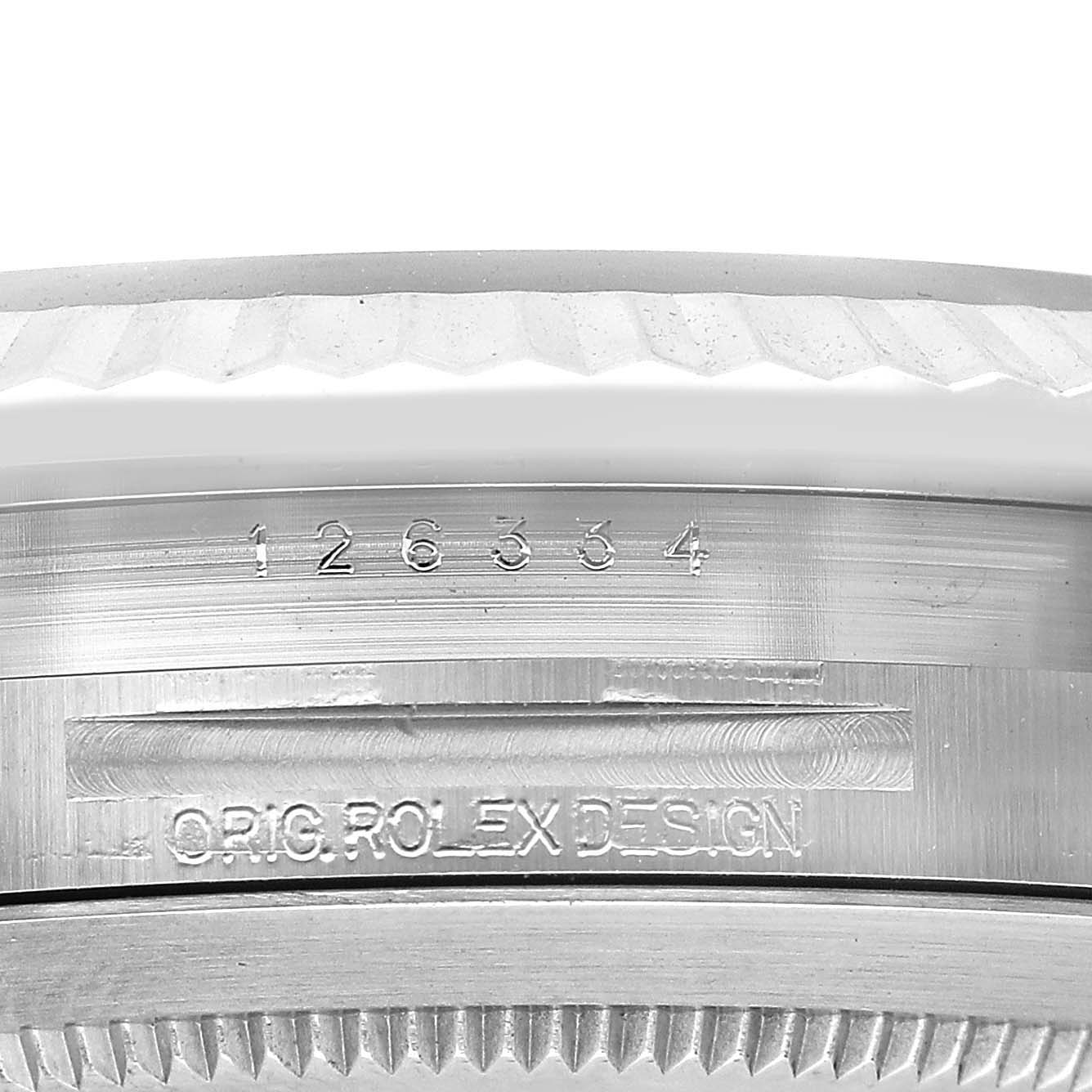 The image shows a close-up of the bezel and case side of the Rolex Datejust 41 126334 Men's Stainless Steel Blue Dial, highlighting the model number and "ORIG ROLEX DESIGN."