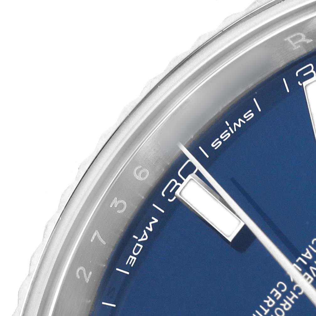 The image shows a partial close-up of the Rolex Datejust 41 126334 Men's Stainless Steel Blue Dial's blue dial with visible hour markers and text.