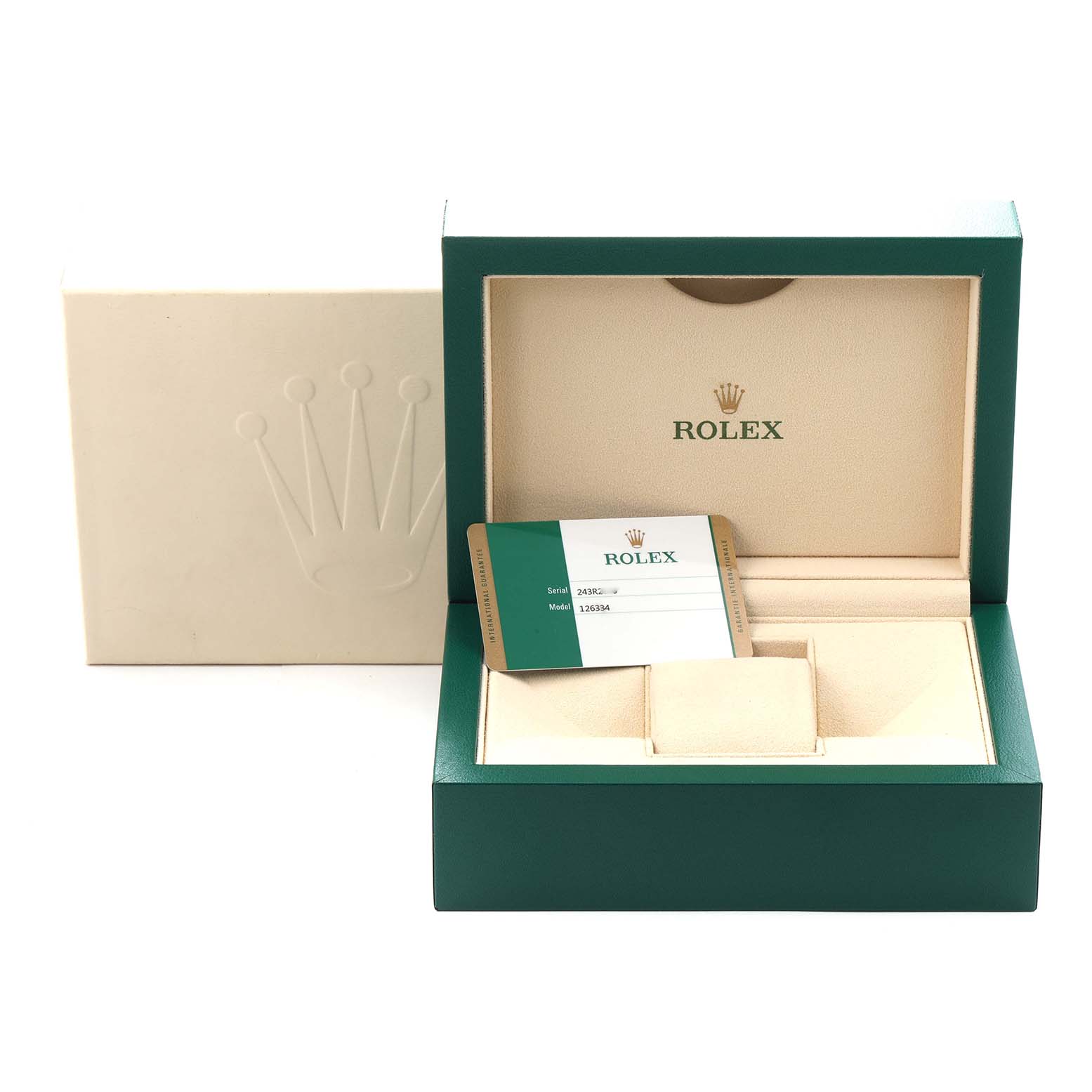 The image shows an open Rolex Datejust 41 model 126334 box, revealing the watch slot and warranty card inside.