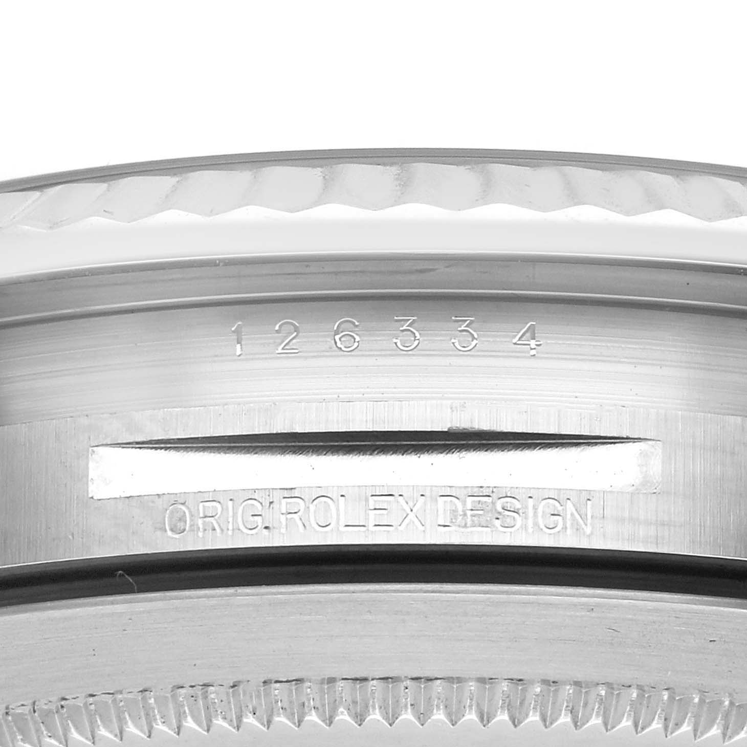 The image shows a close-up of the case side with the engraved model number 126334 of the Rolex Datejust 41, highlighting the fluted bezel and "Orig Rolex Design" marking.