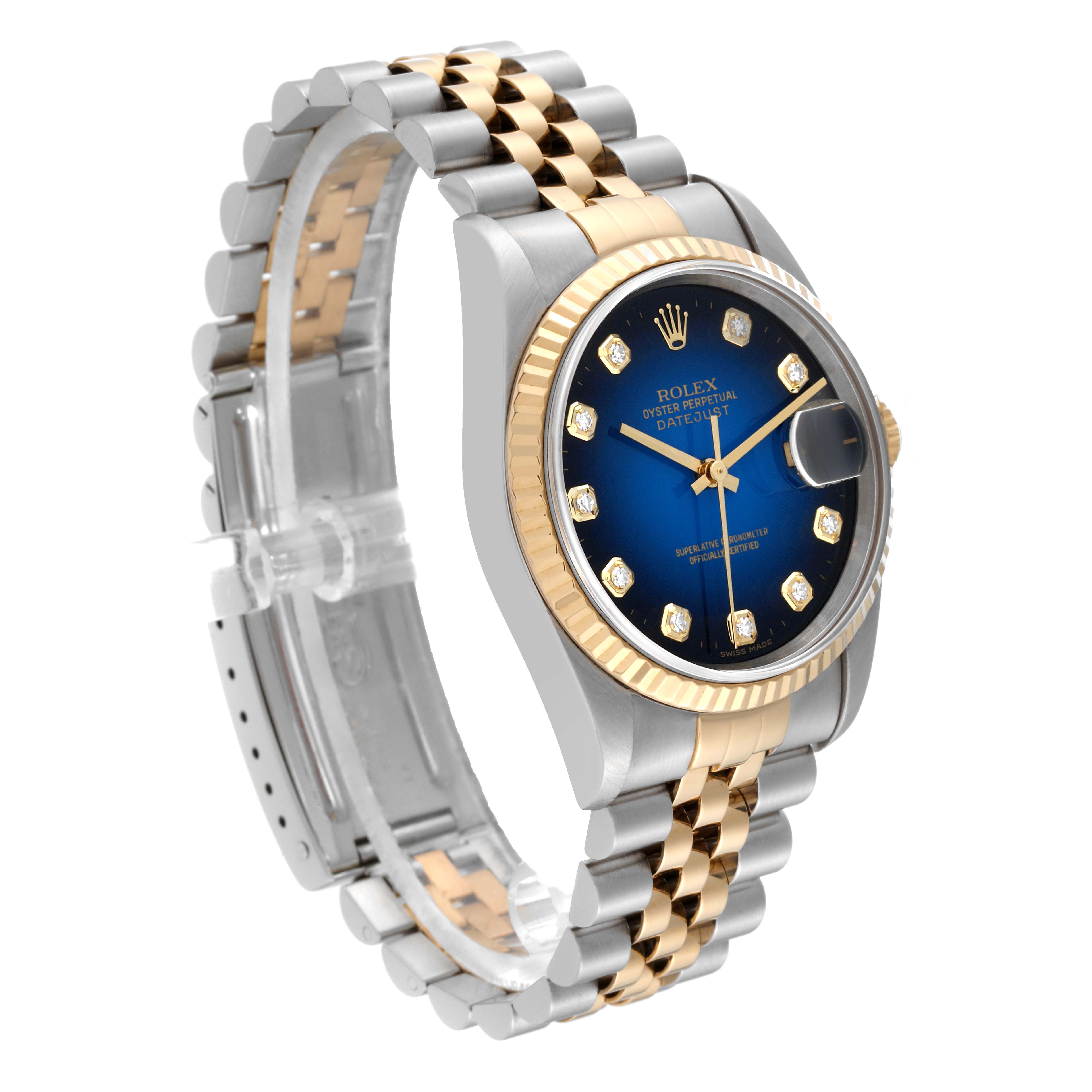 The Rolex Datejust 16233 Men's Steel and Gold (two tone) Blue Dial 16233 Men's Steel and Gold (two tone) Blue Dial watch is shown at a three-quarter angle, displaying its case, bracelet, bezel, and blue dial.