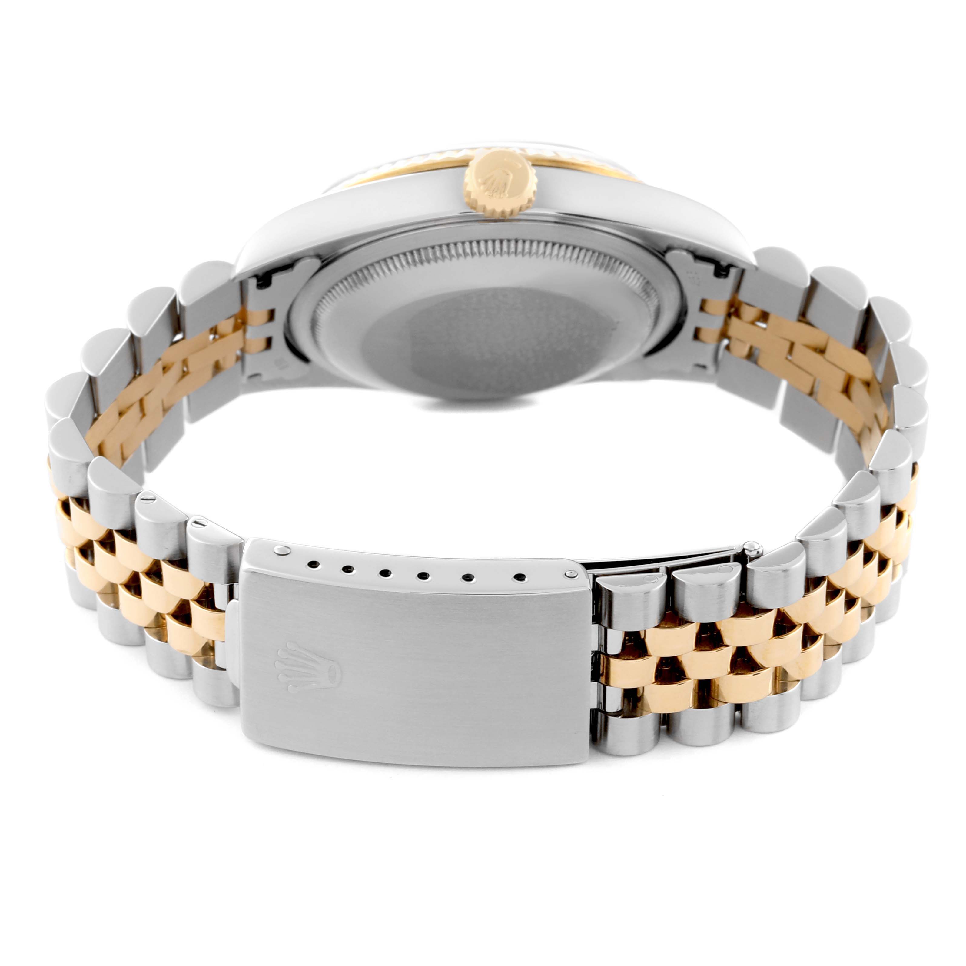 The image shows the back view of a Rolex Datejust 16233 Men's Steel and Gold (two tone) Blue Dial 16233 Men's Steel and Gold (two tone) Blue Dial watch with a two-tone metal bracelet and clasp.