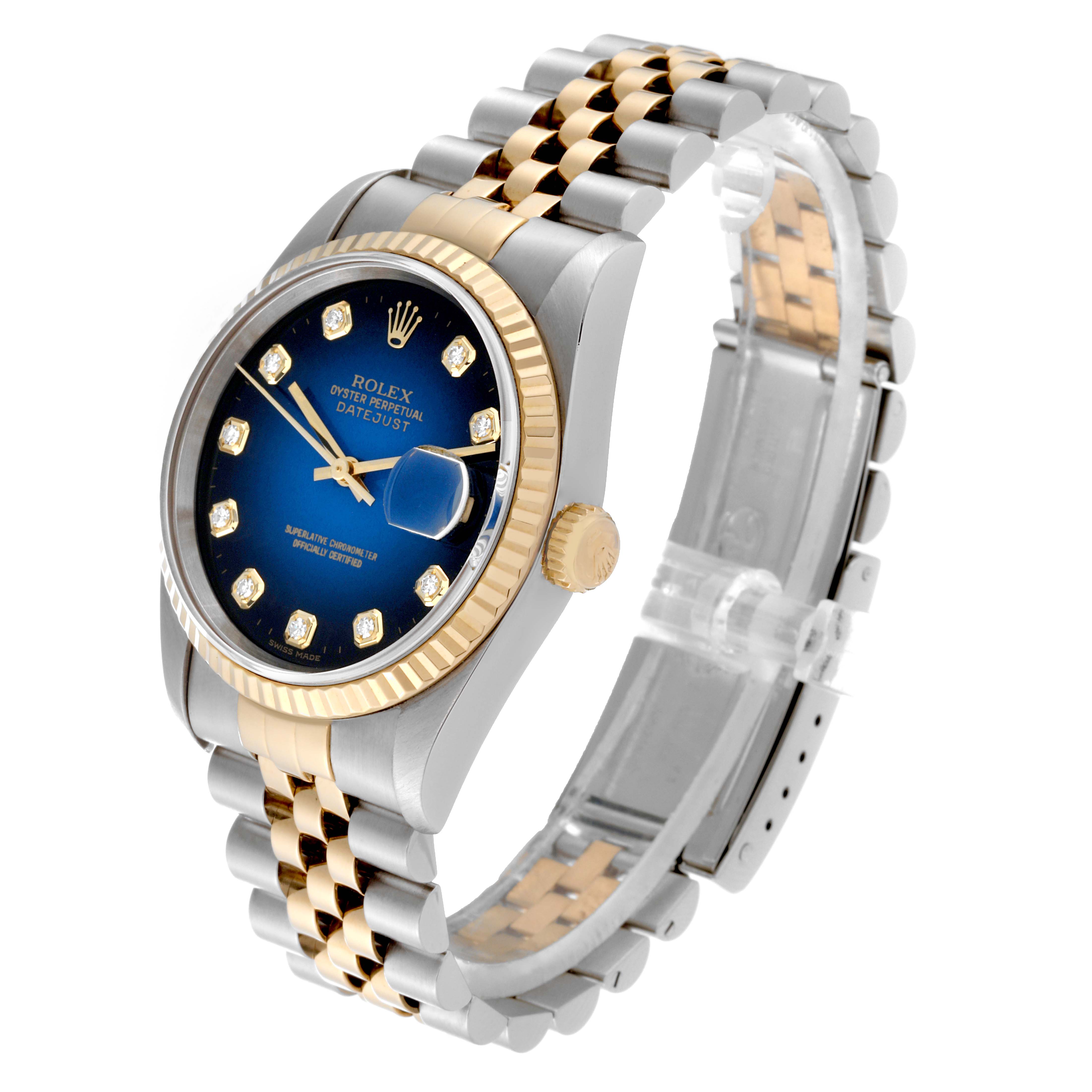 The image shows the Rolex Datejust 16233 Men's Steel and Gold (two tone) Blue Dial 16233 Men's Steel and Gold (two tone) Blue Dial watch at a slight angle, highlighting its face, bracelet, and crown.