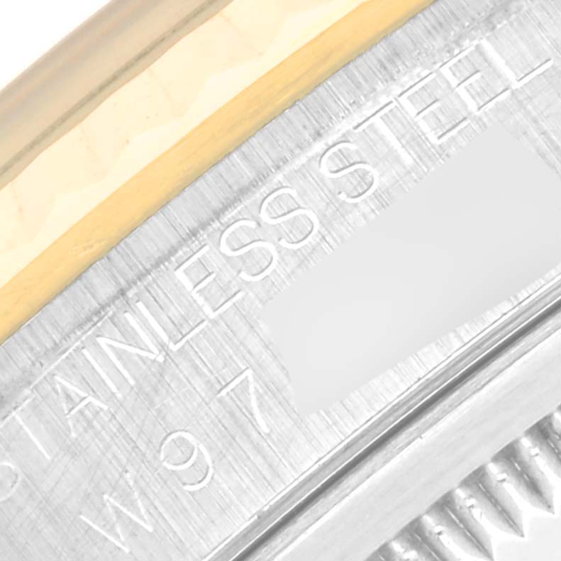 This image shows a close-up of the bezel and engraving on the side of a Rolex Datejust 16233 Men's Steel and Gold (two tone) Blue Dial 16233 Men's Steel and Gold (two tone) Blue Dial watch.