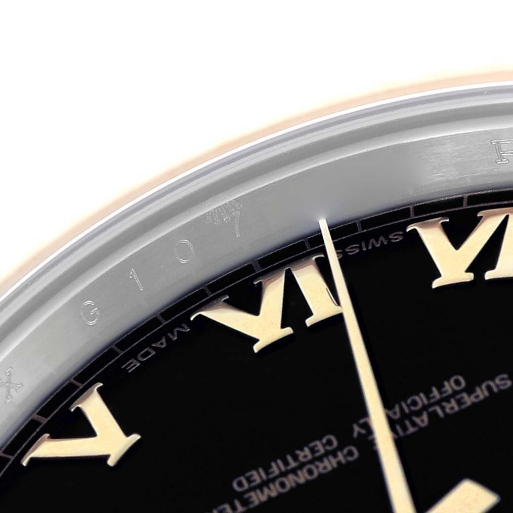 The image shows a close-up of the Rolex Datejust 41 model 116333, focusing on part of the bezel, a Roman numeral hour marker, and the edge of the dial.