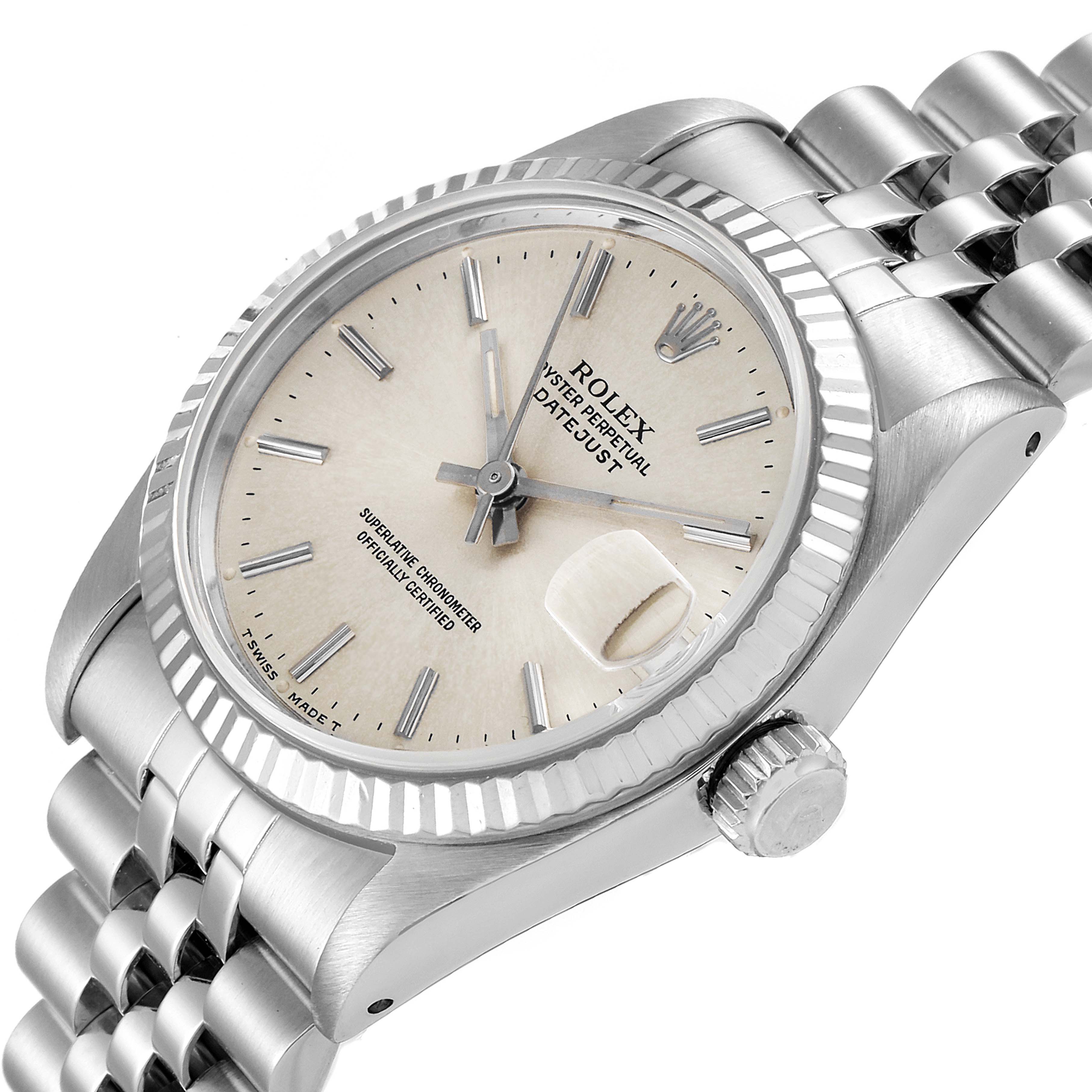 This image shows a Rolex Mid-Size 68274 Women's Stainless Steel Silver Dial 68274 Women's Stainless Steel Silver Dial model watch at a slight diagonal angle, highlighting its dial, bezel, crown, and part of the bracelet.