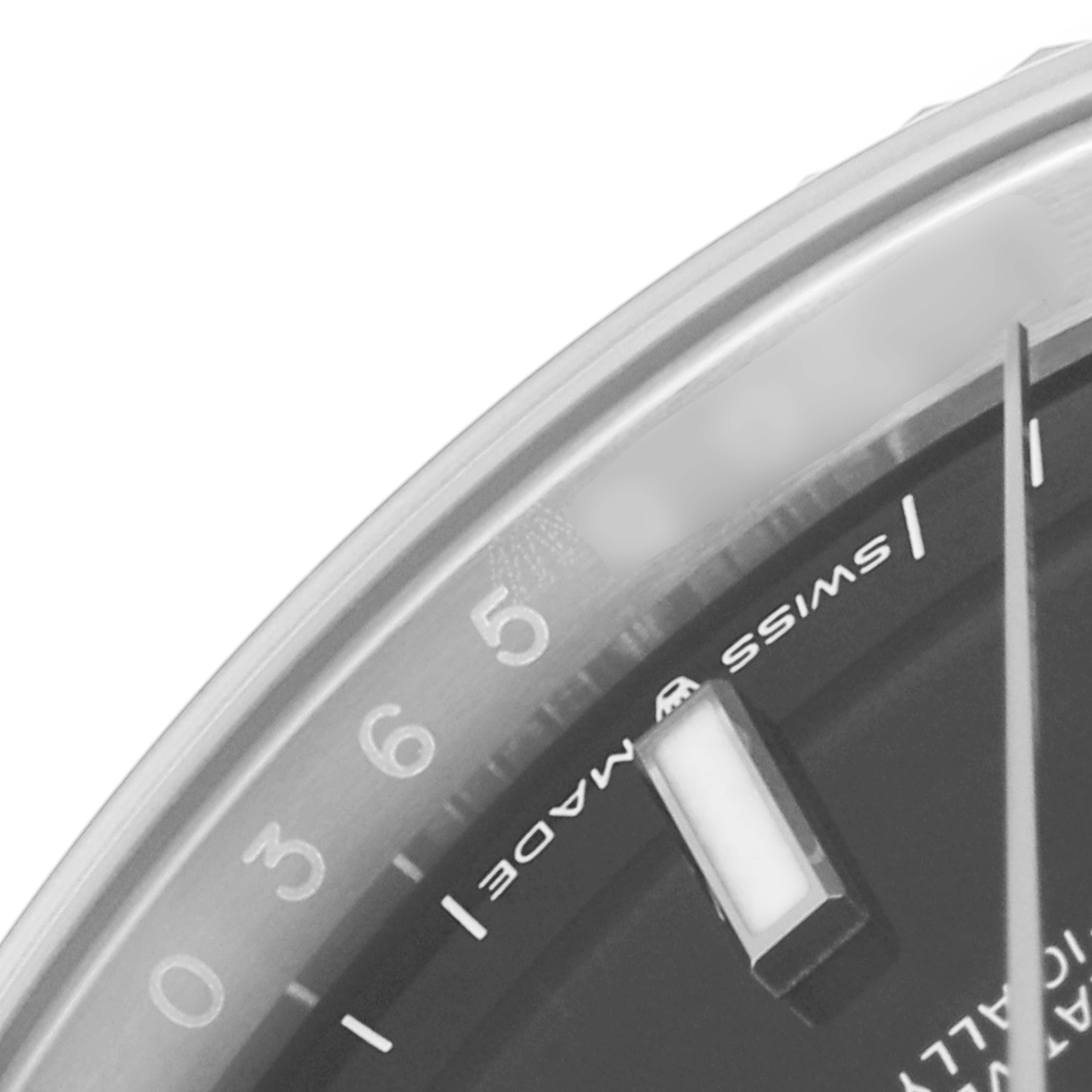 This close-up shows the edge of the dial and part of the bezel of a Rolex Datejust 126234 Men
s Stainless Steel Black Dial 126234 Men
s Stainless Steel Black Dial watch.