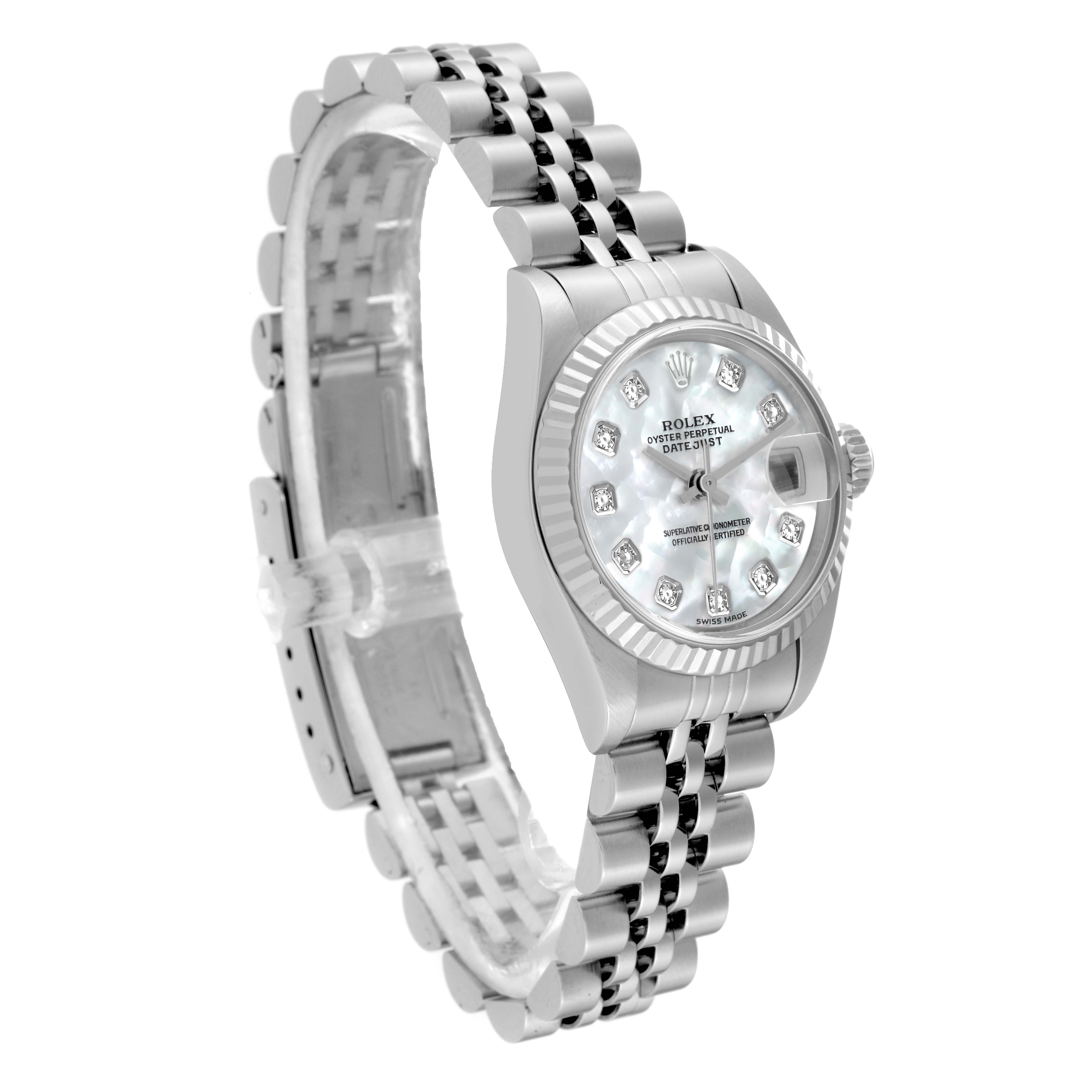 This image shows a Rolex Datejust 79174 Women's Stainless Steel Mother of Pearl Dial 79174 Women's Stainless Steel Mother of Pearl Dial watch from a three-quarter angle, displaying the dial, bezel, and bracelet.