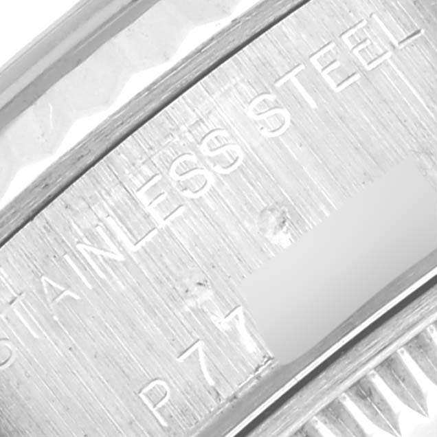 This image shows a close-up of the inner bezel of a Rolex Datejust 79174 Women's Stainless Steel Silver Dial 79174 Women's Stainless Steel Silver Dial watch, indicating "STAINLESS STEEL."
