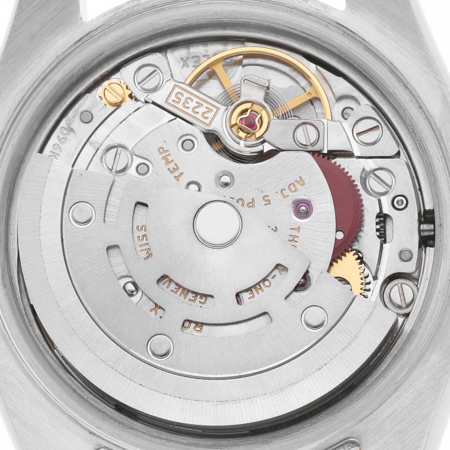 The image shows the internal movement of a Rolex Datejust model 179383G watch, focusing on the intricate gears and rotor mechanism.