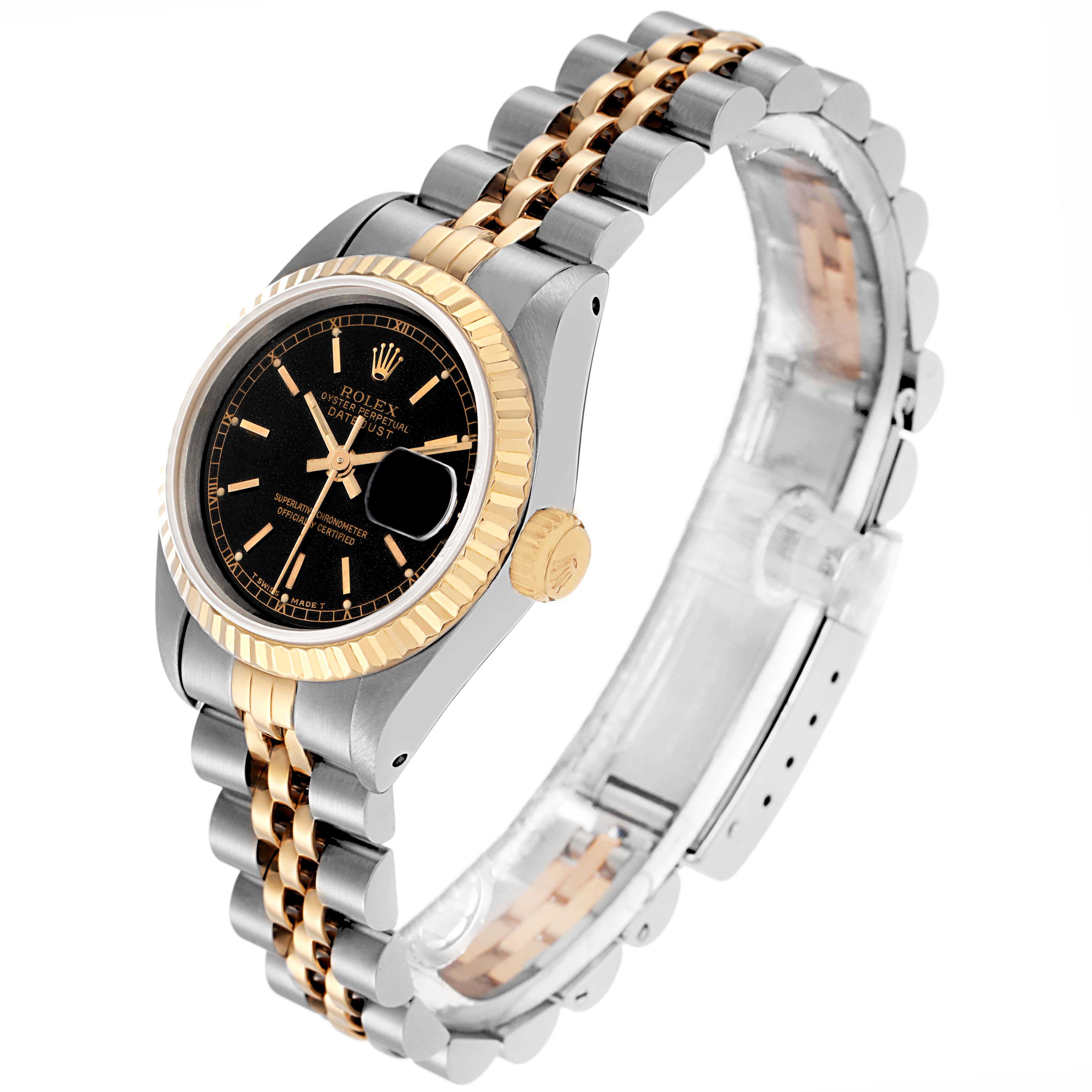 The Rolex Datejust model 69173 is shown at a three-quarter angle, featuring the bezel, dial, crown, and part of the bracelet.