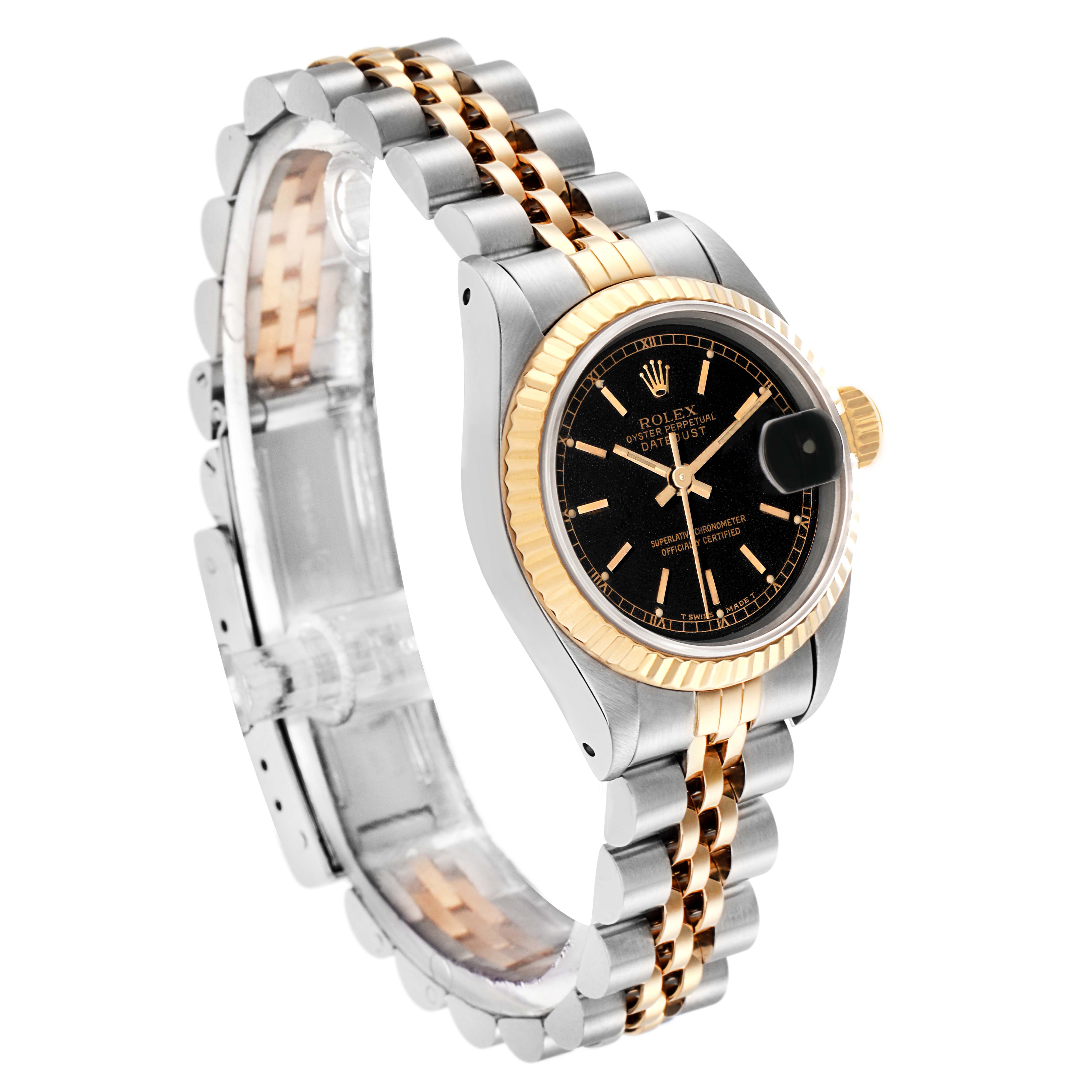 The image shows a Rolex Datejust model 69173 men's watch at a three-quarter angle, highlighting the black dial, gold fluted bezel, and two-tone Jubilee bracelet.
