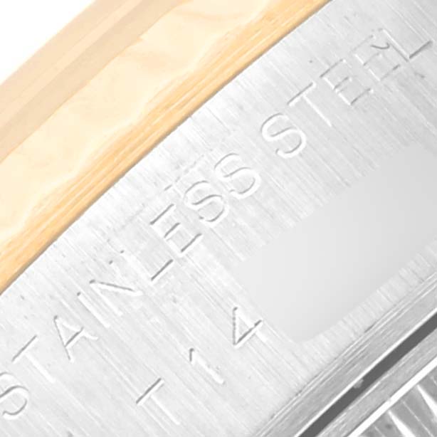 This image shows a close-up of the side of a Rolex Datejust 69173 Women's Steel and Gold (two tone) Champagne Dial 69173 Women's Steel and Gold (two tone) Champagne Dial watch, highlighting the stainless steel caseback.