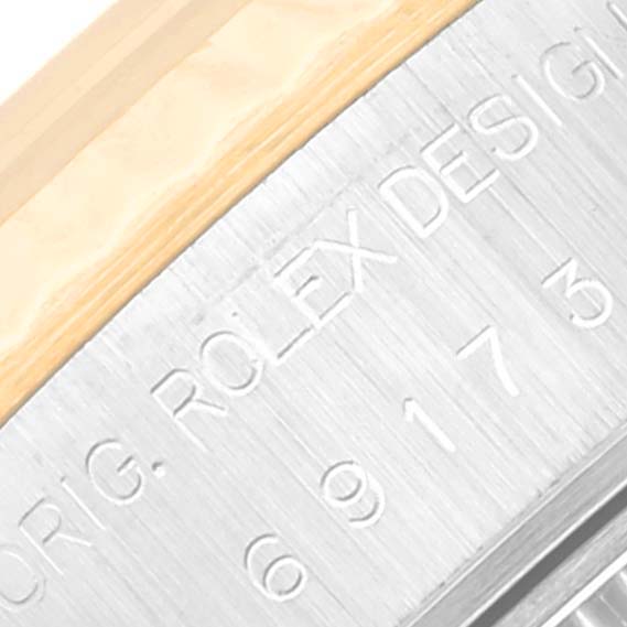This image shows a close-up of the side engraving on a Rolex Datejust 69173 Women's Steel and Gold (two tone) Champagne Dial 69173 Women's Steel and Gold (two tone) Champagne Dial watch, highlighting the model details.