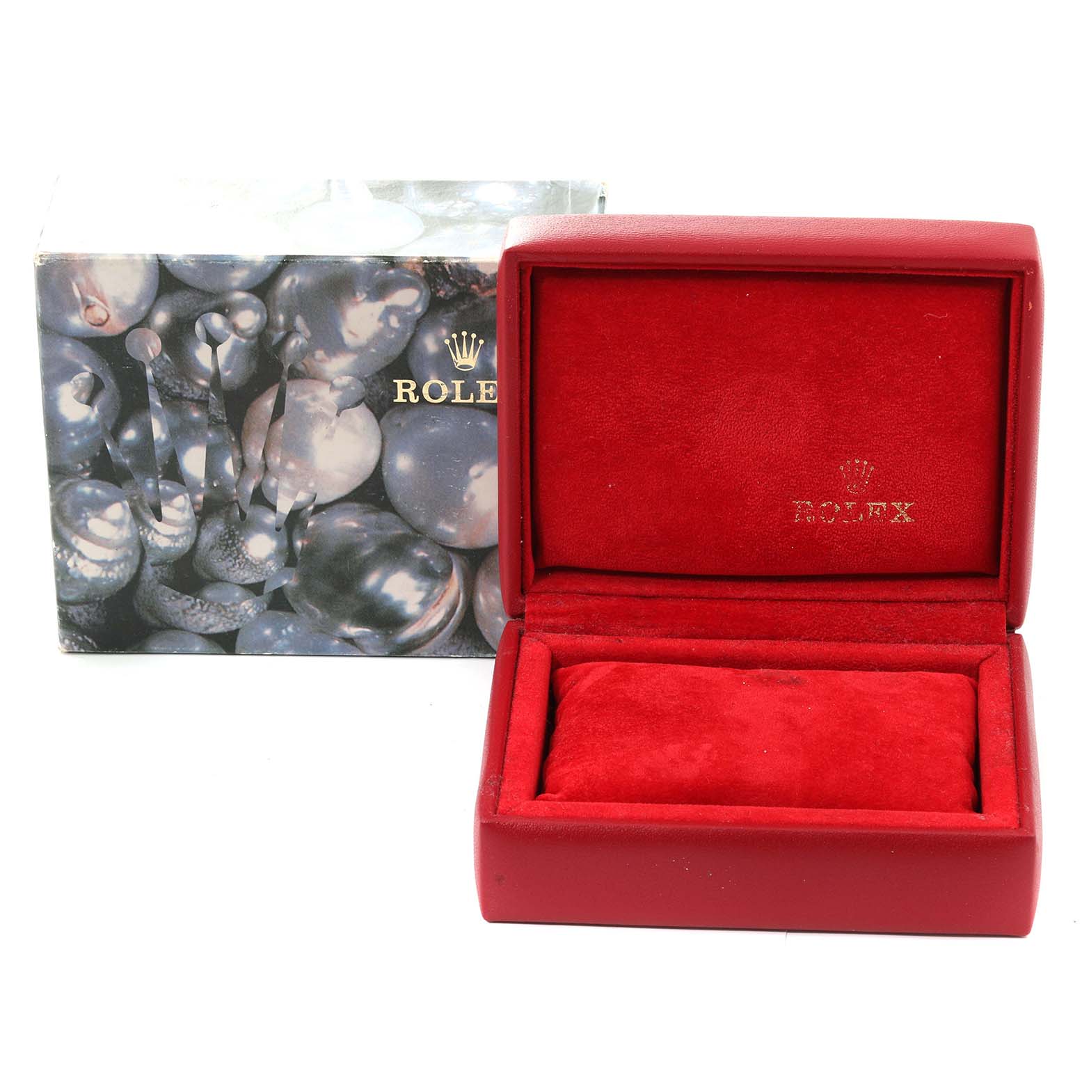 This image shows a red Rolex Datejust 69173 Women's Steel and Gold (two tone) Champagne Dial 69173 Women's Steel and Gold (two tone) Champagne Dial watch box and an outer packaging with a pearl design.