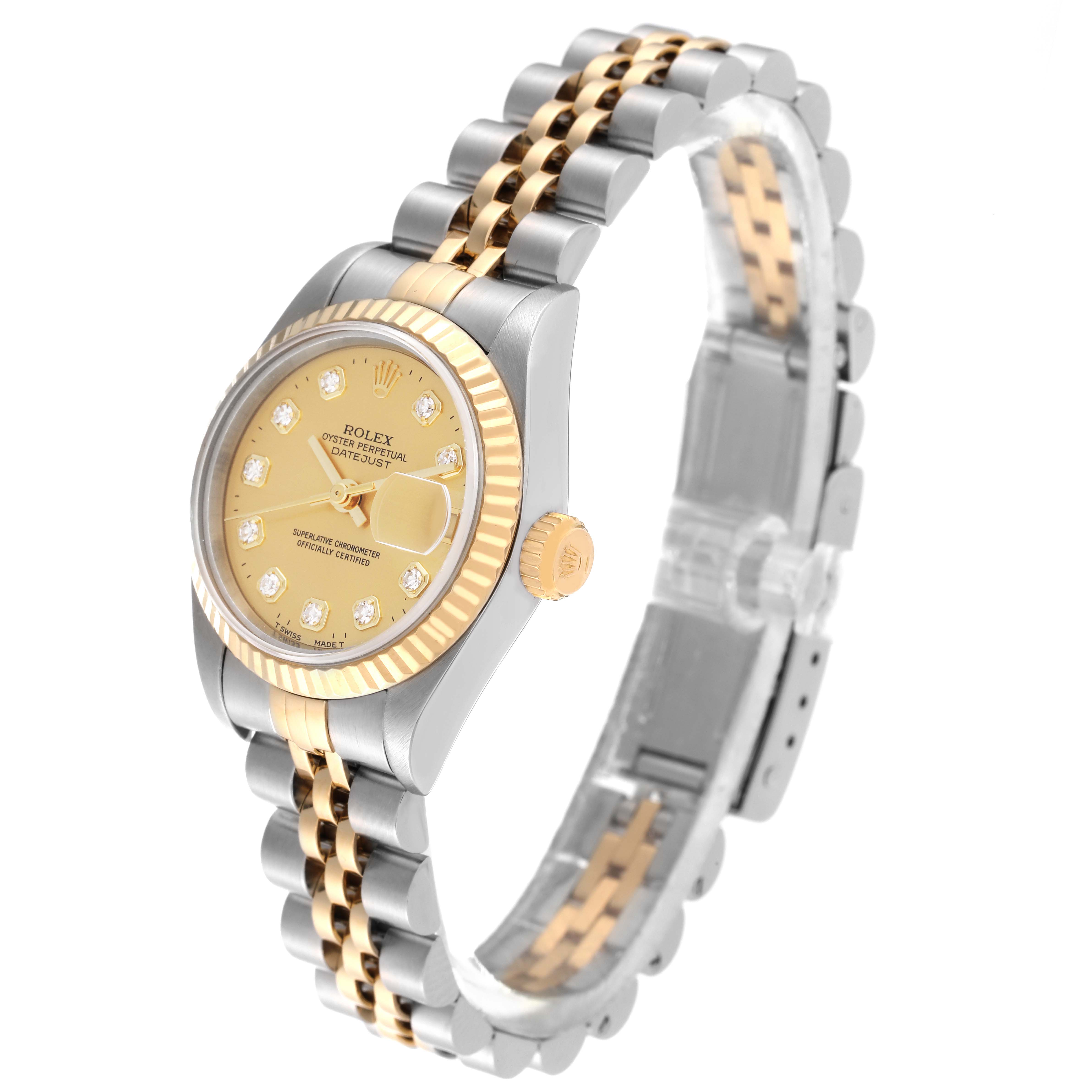 This image shows a Rolex Datejust 69173 Women's Steel and Gold (two tone) Champagne Dial 69173 Women's Steel and Gold (two tone) Champagne Dial watch at a side angle, highlighting its dial, fluted bezel, and jubilee bracelet.
