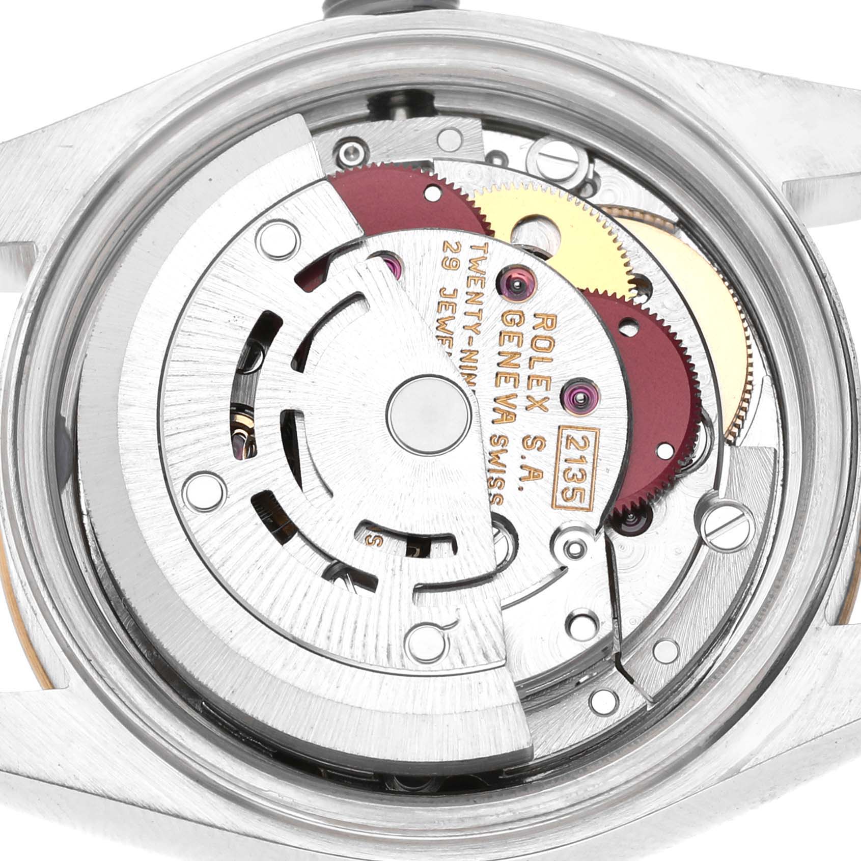 The image shows the movement mechanism from the back of a Rolex Datejust 69173 Women's Steel and Gold (two tone) White Dial, highlighting gears and inscriptions.