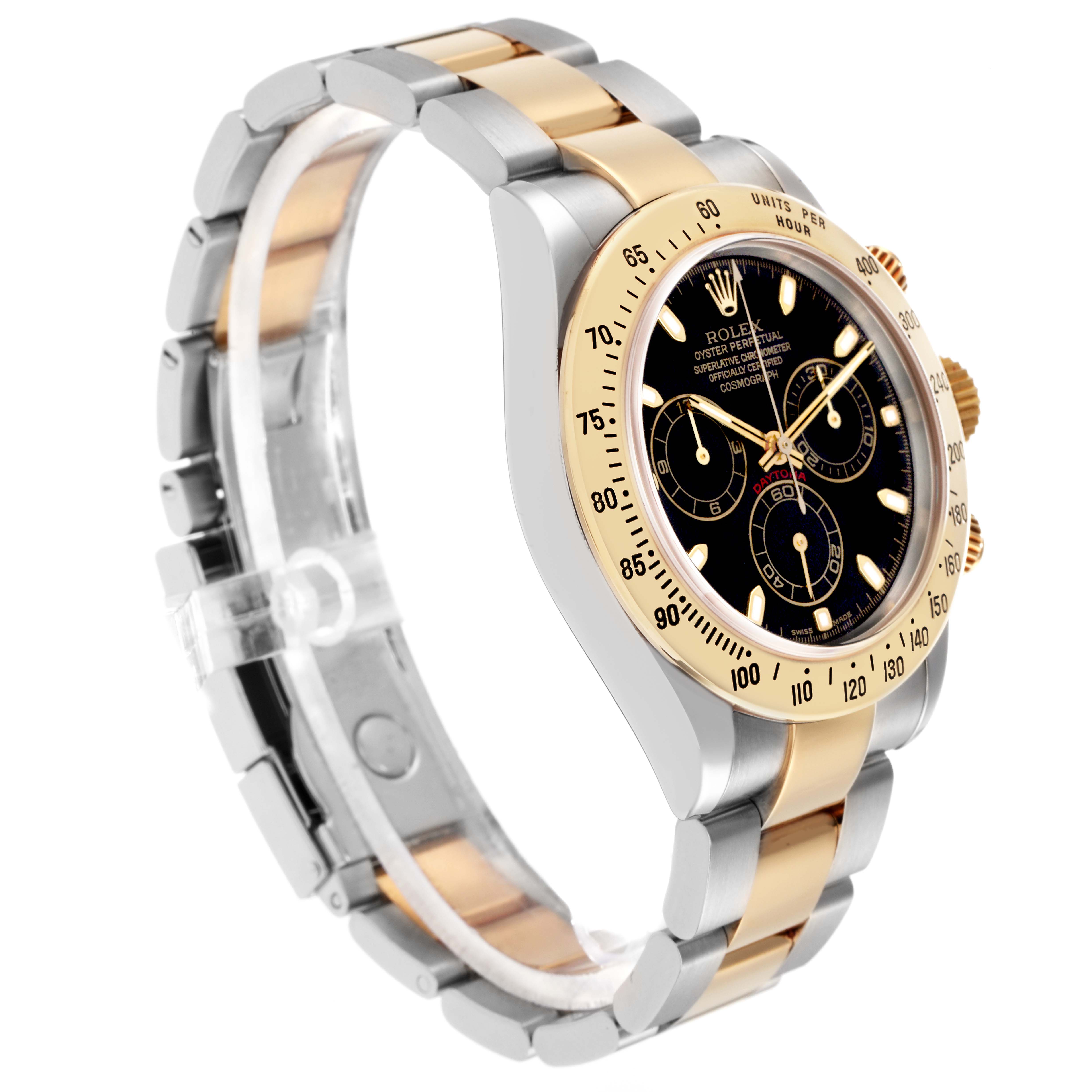 The Rolex Daytona model 116523 is shown from a side angle, displaying its gold and silver bracelet, bezel, and black dial with subdials.