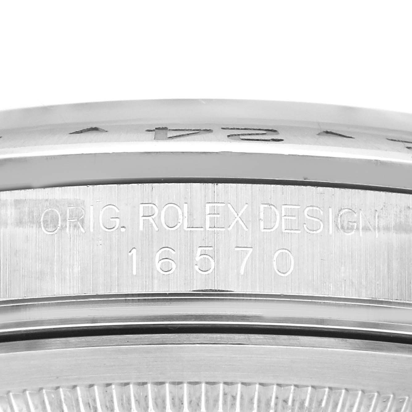 This close-up image shows the engraved case side of the Rolex Explorer 16570 Men's Stainless Steel White Dial 16570 Men's Stainless Steel White Dial model 16570.