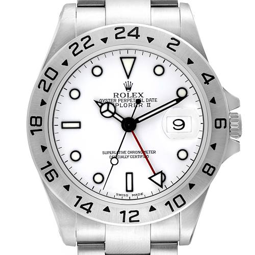 The image shows a front view of a Rolex Explorer II watch, highlighting its white dial, bezel, hands, and date window.