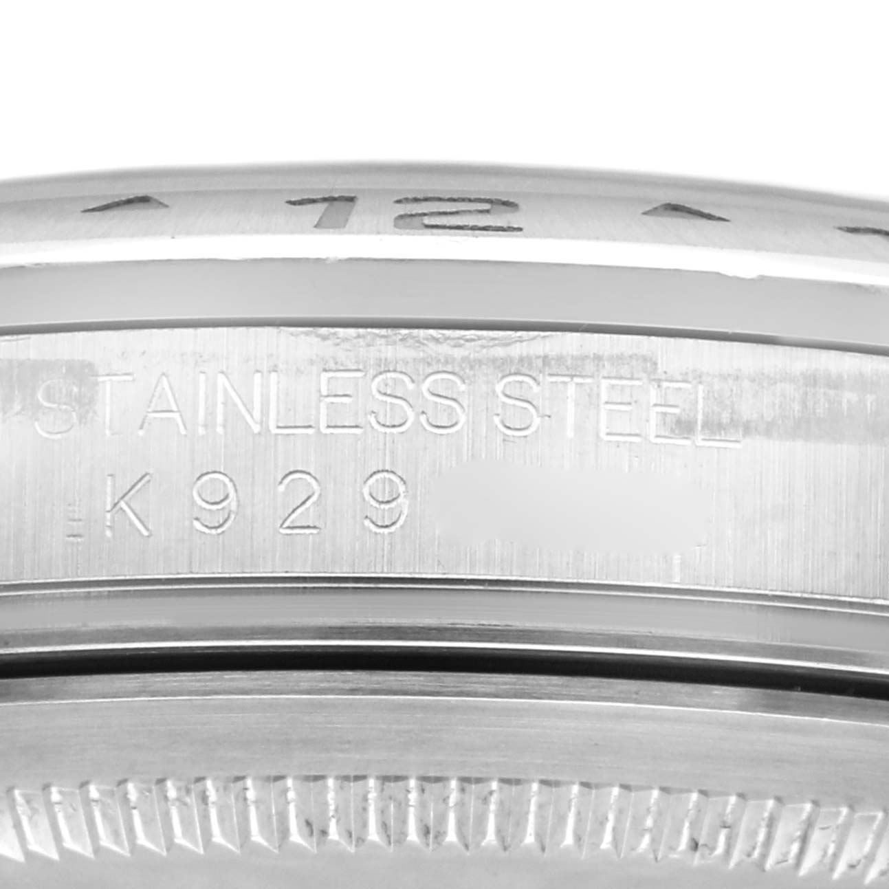 This image shows a close-up of the side of the stainless steel case of a Rolex Explorer 16570 Men's Stainless Steel White Dial 16570 Men's Stainless Steel White Dial watch.