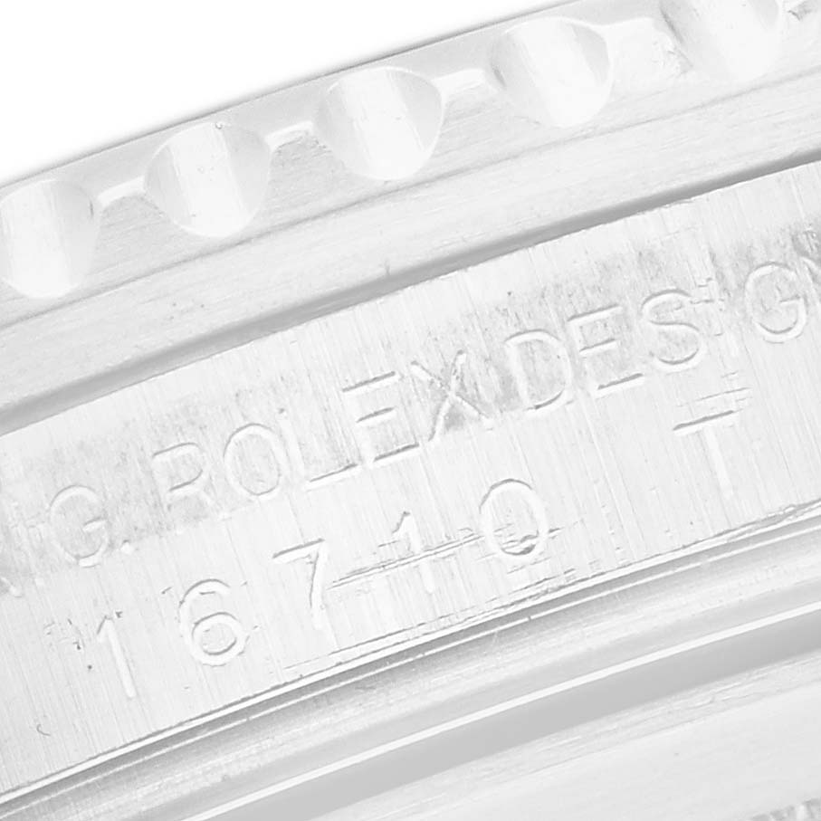The image shows a close-up of the case side of a Rolex GMT-Master, model number 16710, focusing on its engraved markings.