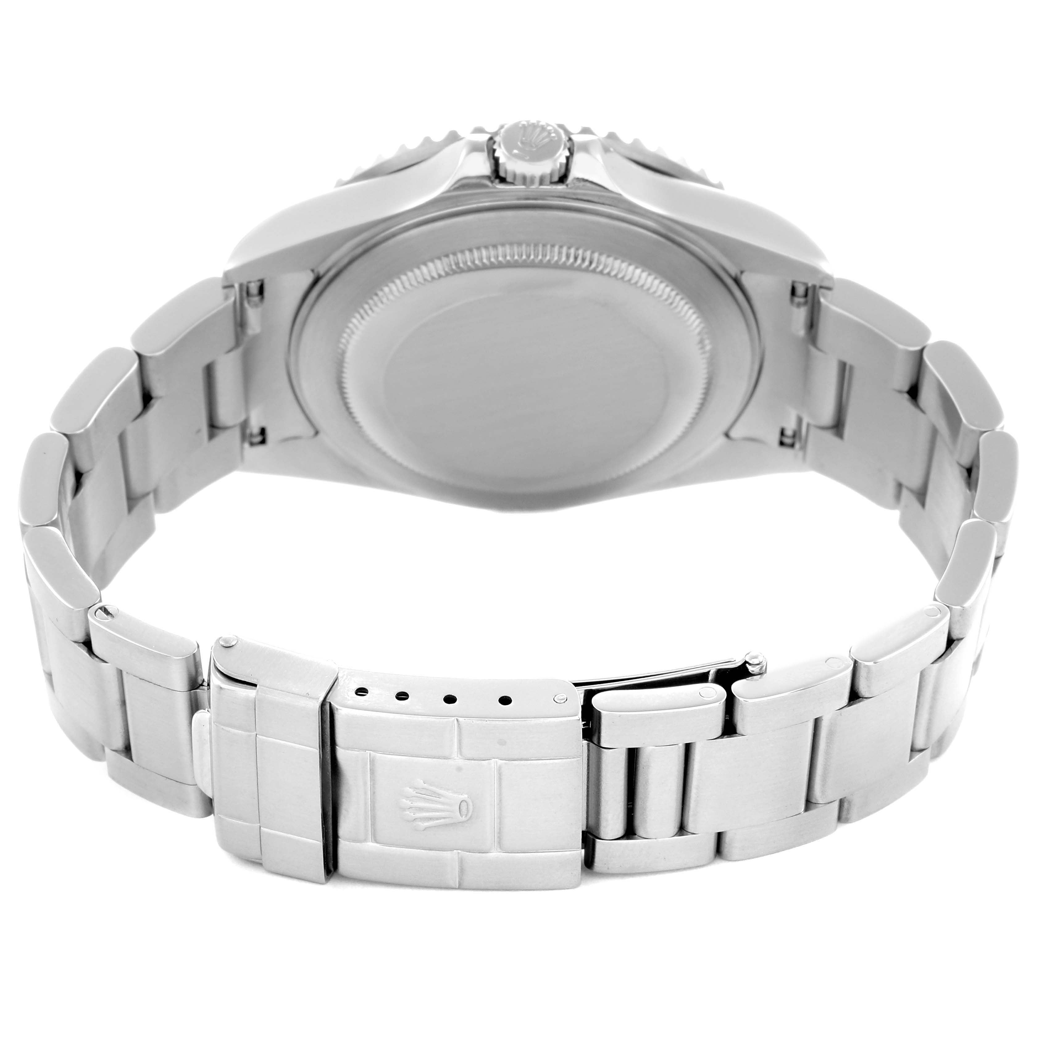 The image shows the back view of a Rolex GMT-Master model 16710 men's watch, highlighting the case back and bracelet clasp.