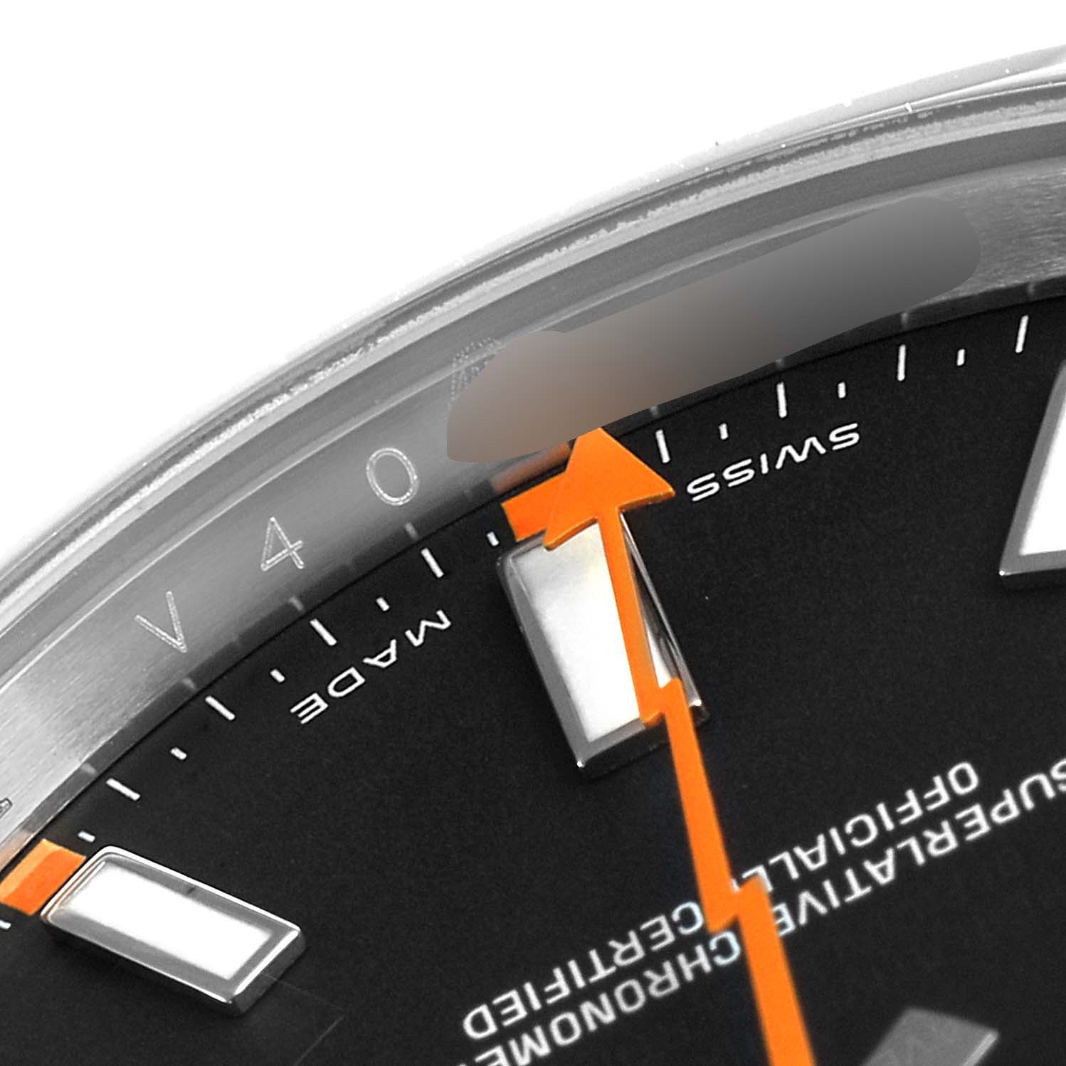 This image shows a close-up of the dial and orange seconds hand of the Rolex Milgauss 116400 Men's Stainless Steel Black Dial 116400 Men's Stainless Steel Black Dial watch.