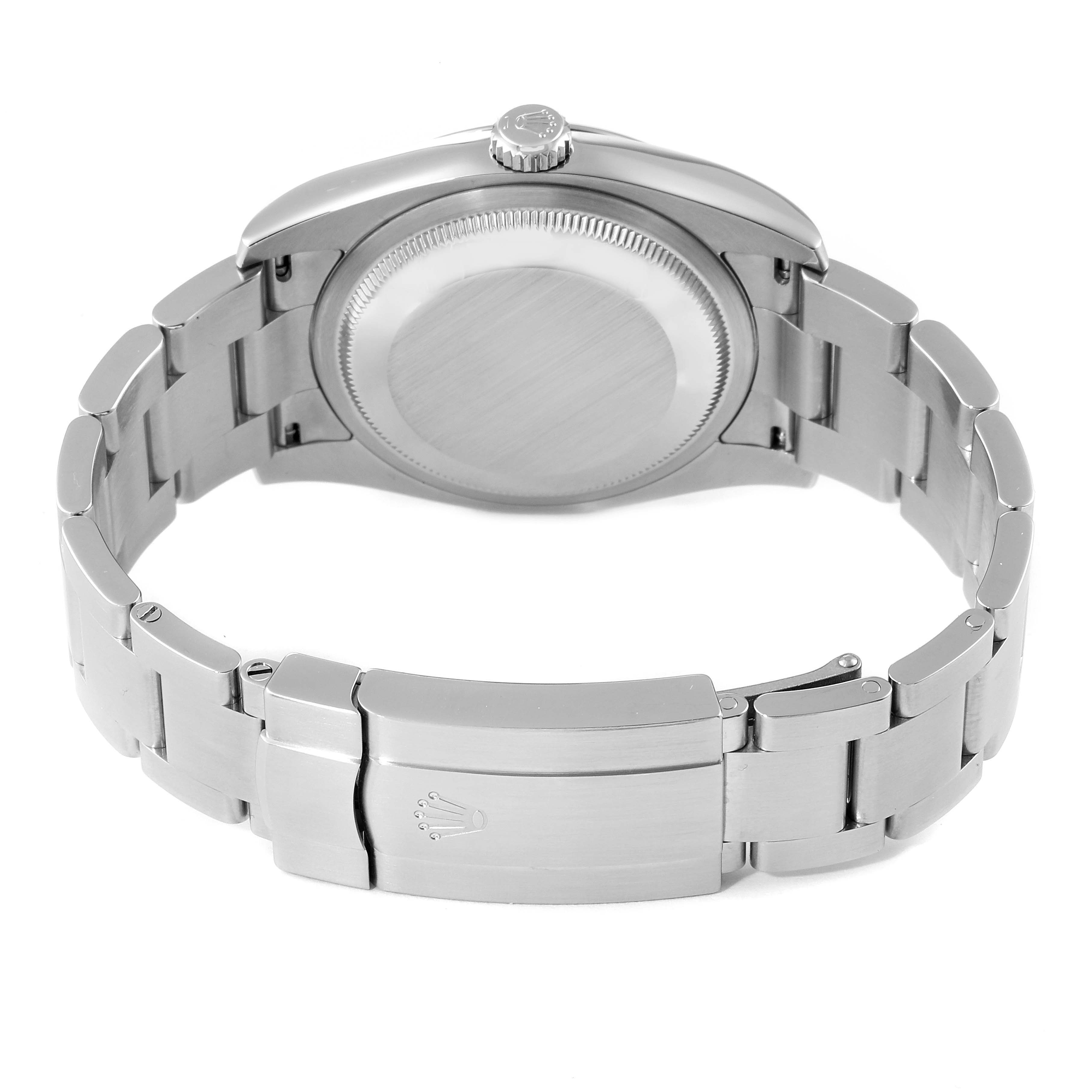 The image shows the back and bracelet of a Rolex Oyster Perpetual 116000 Men's Stainless Steel Champagne Dial 116000 Men's Stainless Steel Champagne Dial watch, focusing on the case back and clasp.