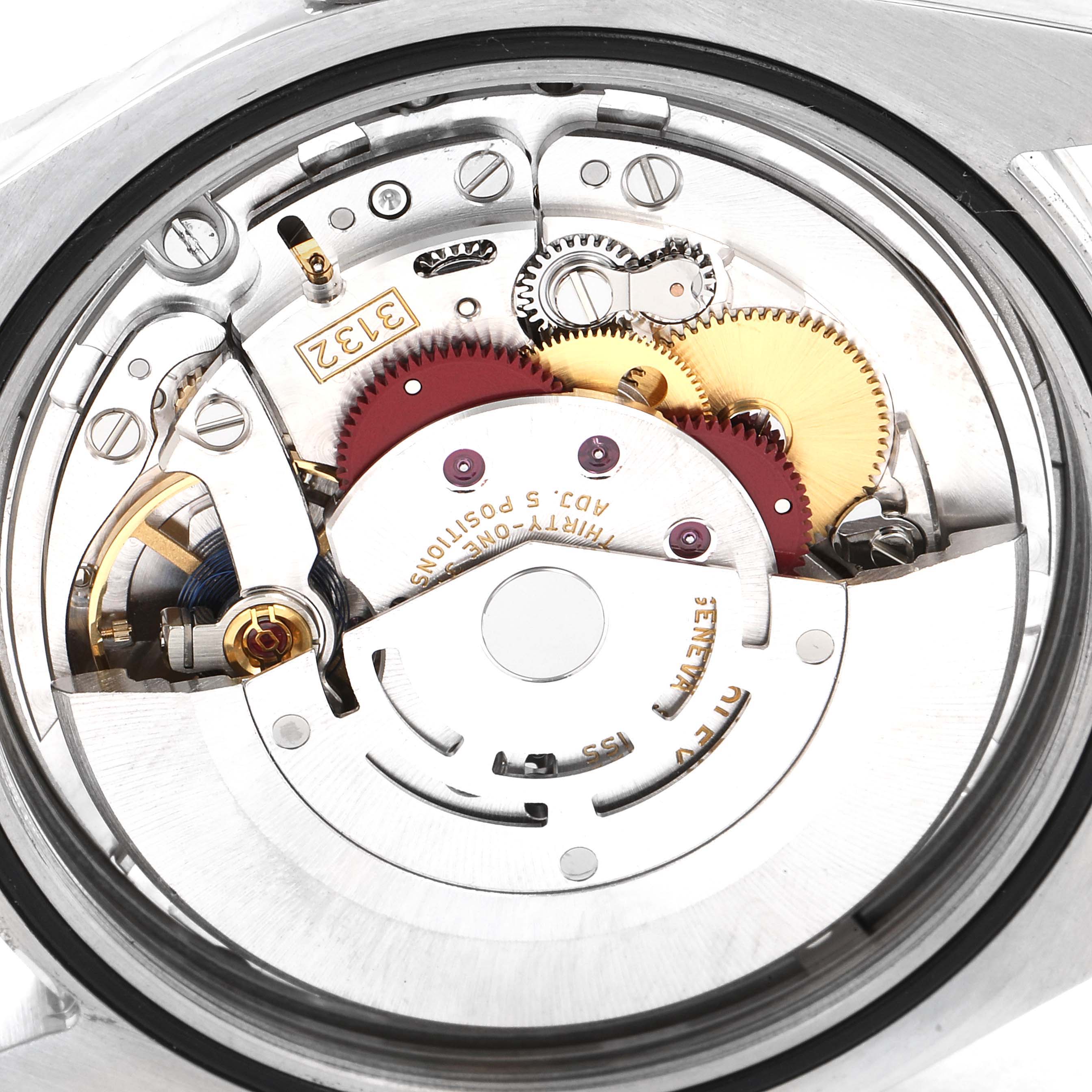 The image shows the inner mechanical movement components of a Rolex Oyster Perpetual 114300 Men
s Stainless Steel Blue Dial 114300 Men
s Stainless Steel Blue Dial watch.