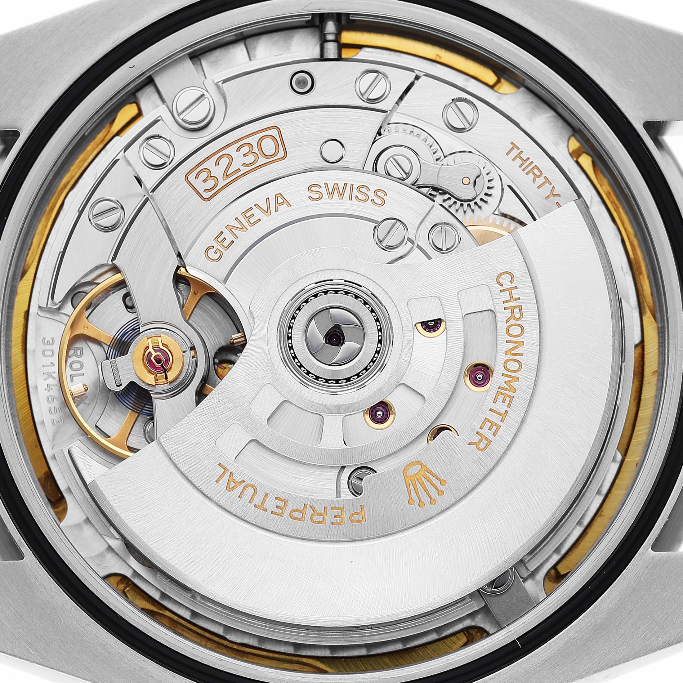The image shows a detailed view of the movement from the back of the Rolex Oyster Perpetual 124300 Men's Stainless Steel Blue Dial watch.