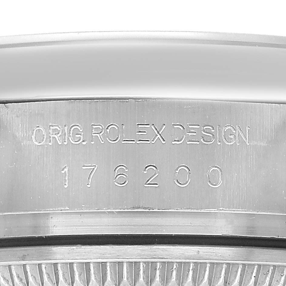 The image shows a close-up of the side of a Rolex Oyster Perpetual 176200 Women's Stainless Steel Green Dial case, displaying the model number "176200" and "Orig. Rolex Design."