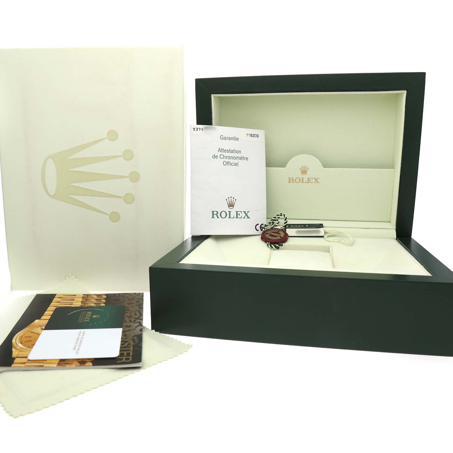 The image shows a Rolex President 118209 Men's White Gold Silver Dial model watch box, papers, and accessories from a front angle.