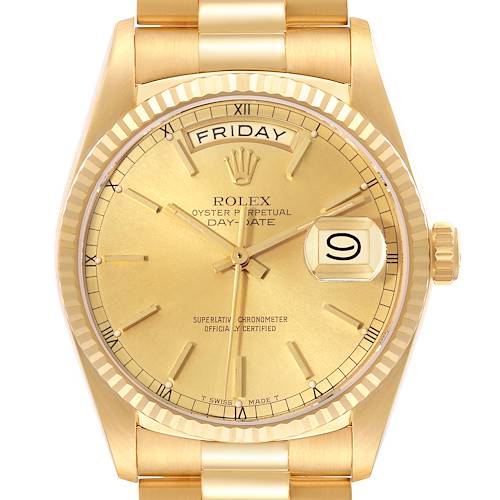 The image shows a gold Rolex President Day-Date watch, featuring the face, bezel, and part of the bracelet, viewed from the front.