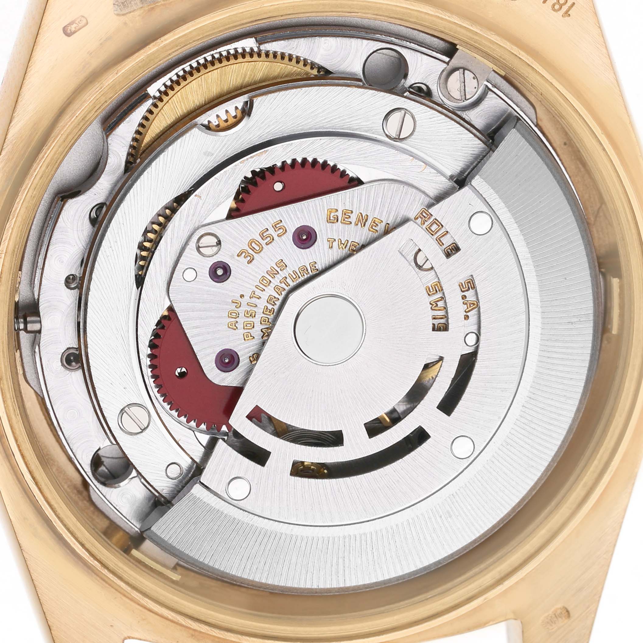 The image shows a close-up of the movement mechanism of a Rolex President 18038 Men's Yellow Gold Champagne Dial watch, viewed from the back.