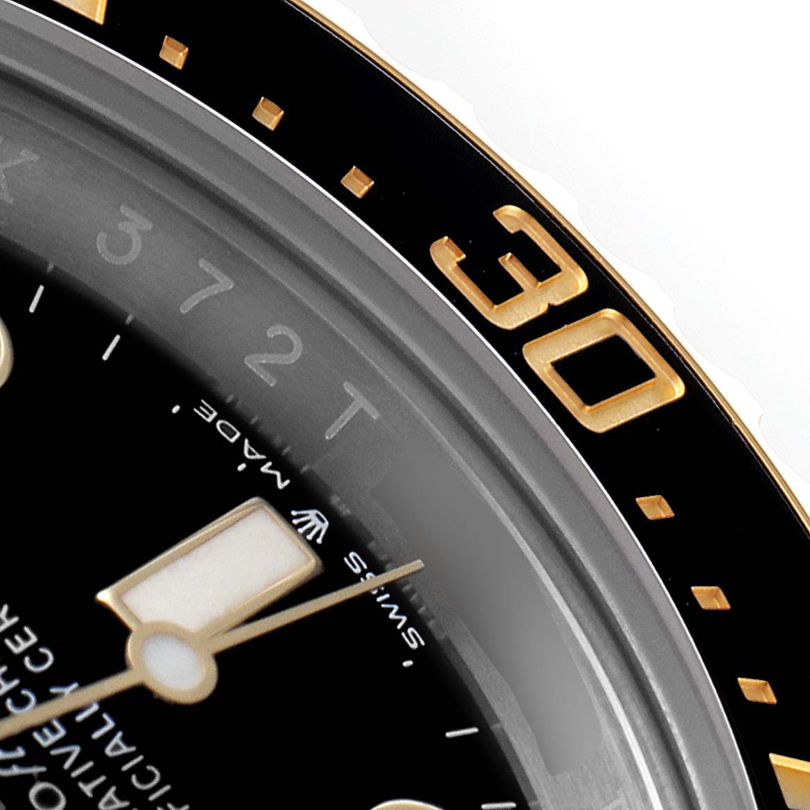 This close-up image shows the bezel, minute hand, and part of the dial of the Rolex Sea-Dweller 126603 Men's Steel and Gold (two tone) Black Dial 126603 Men's Steel and Gold (two tone) Black Dial watch.